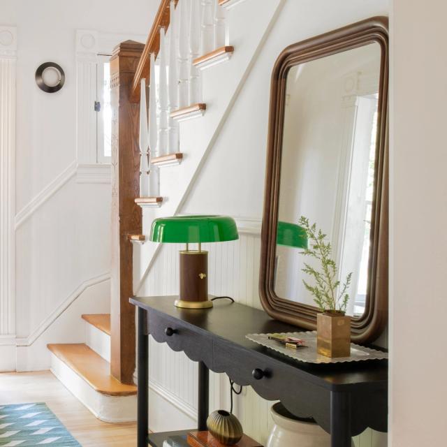 Entryway console table with walnut mirror and table lamp