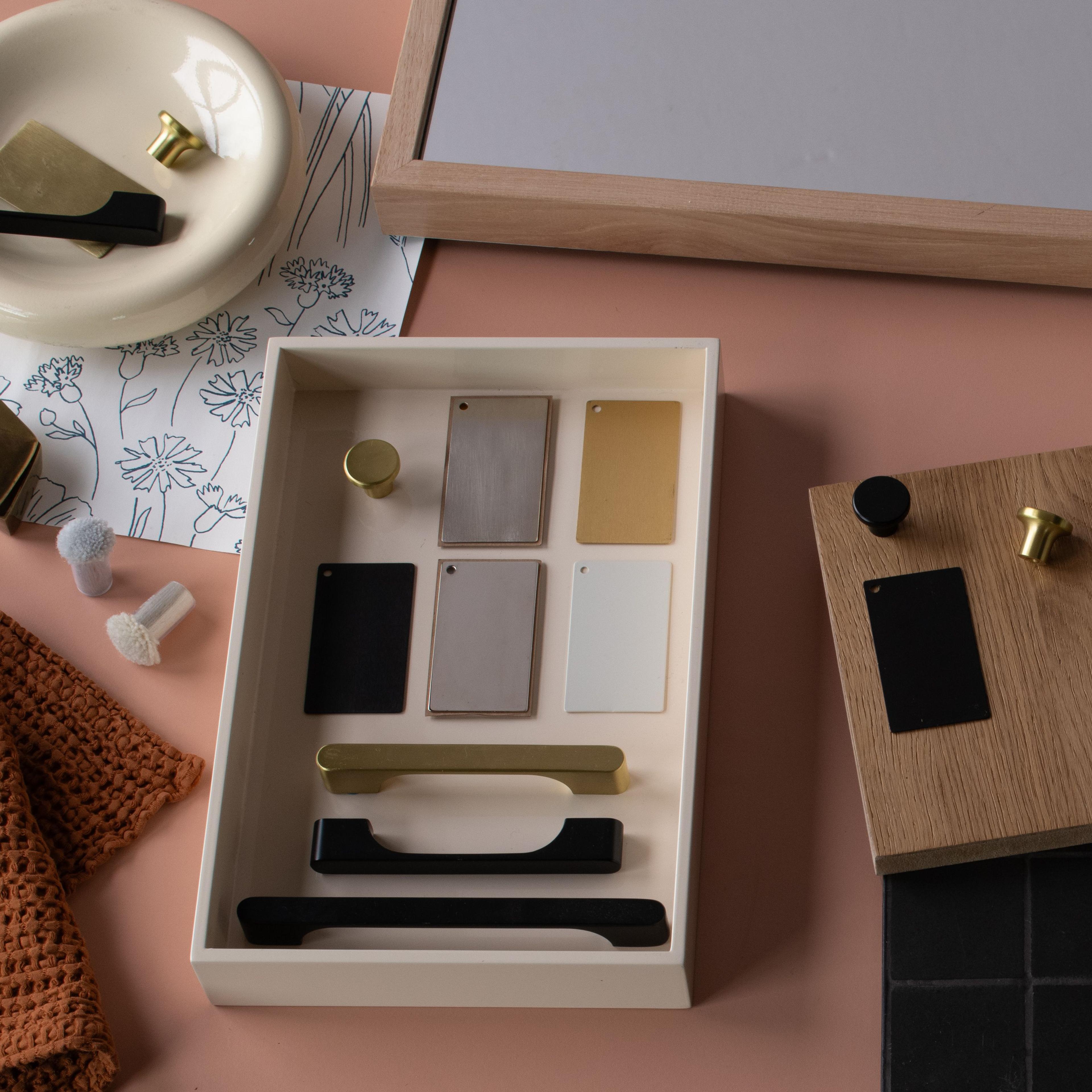 Assortment of cabinet hardware on table