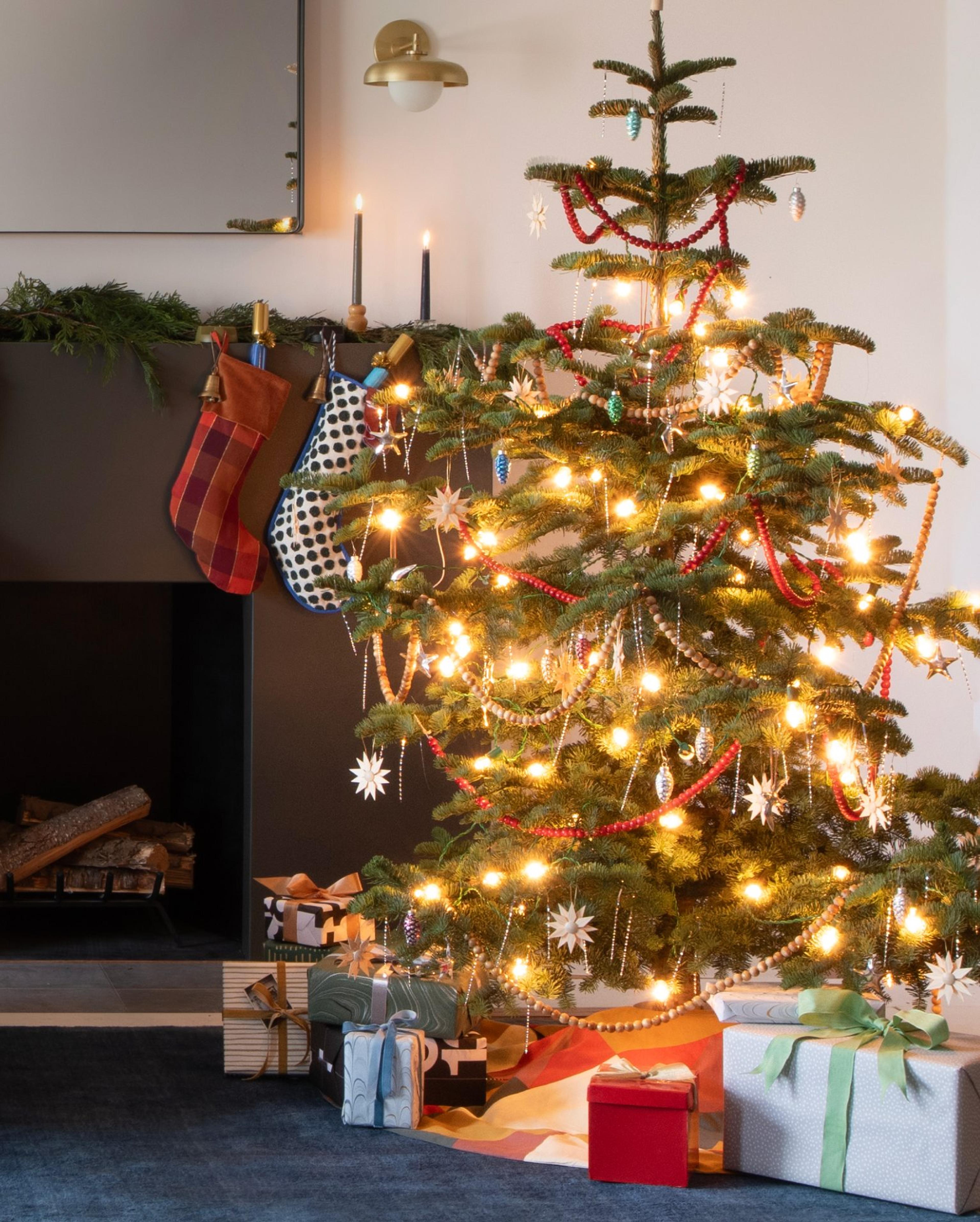 Tree and fireplace decorated for the Holidays 