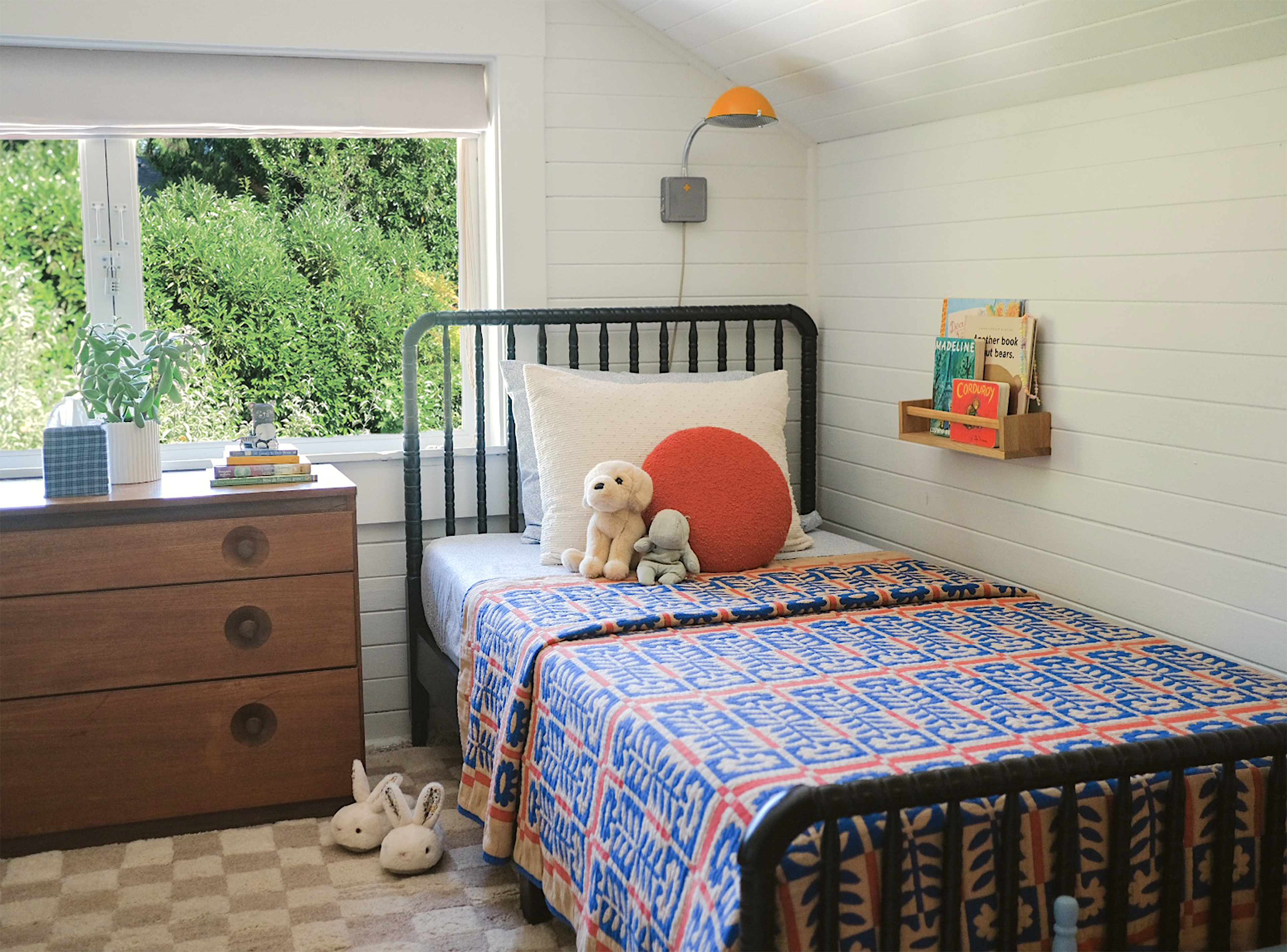 Quilt on kid's bed.