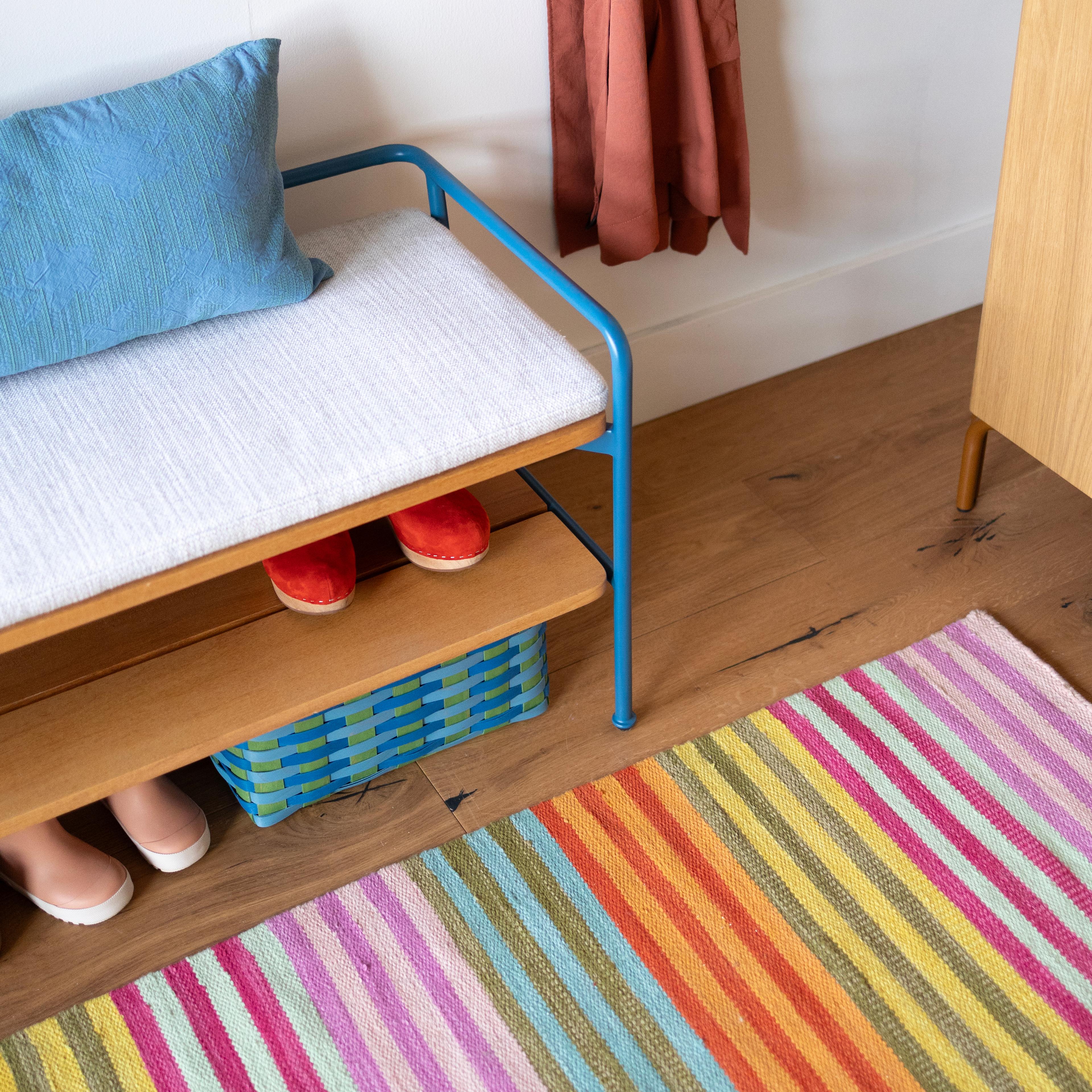 Colorful entryway bench.