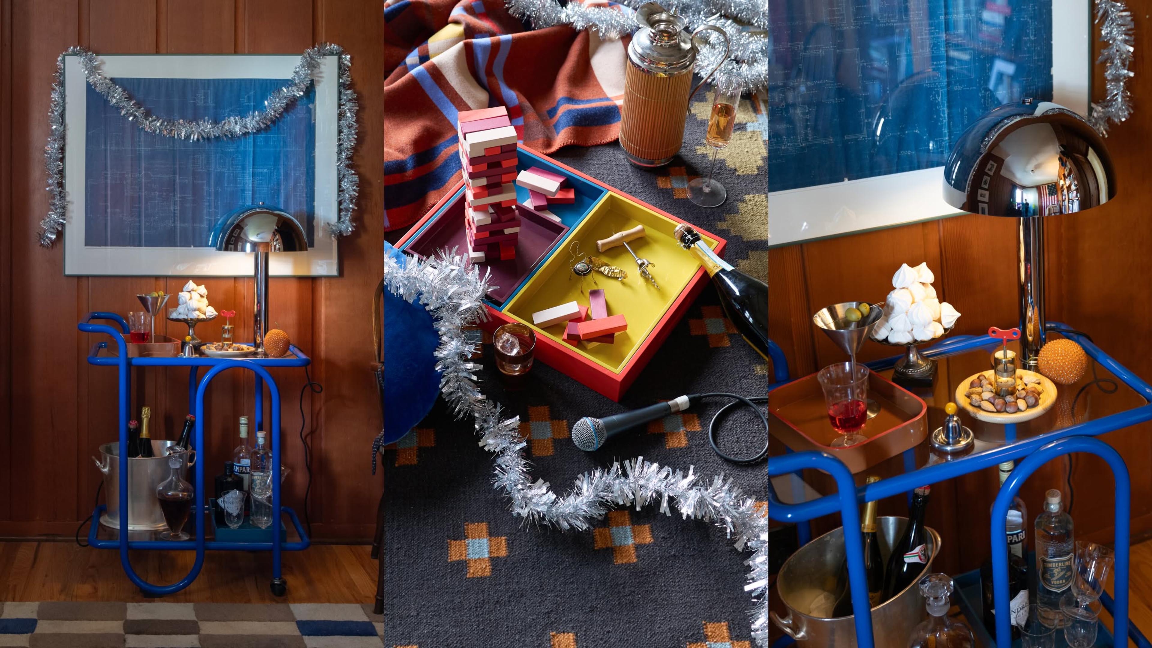 A colorful holiday bar cart styled with drinks, snacks, and silver tinsel in a retro-inspired interior.