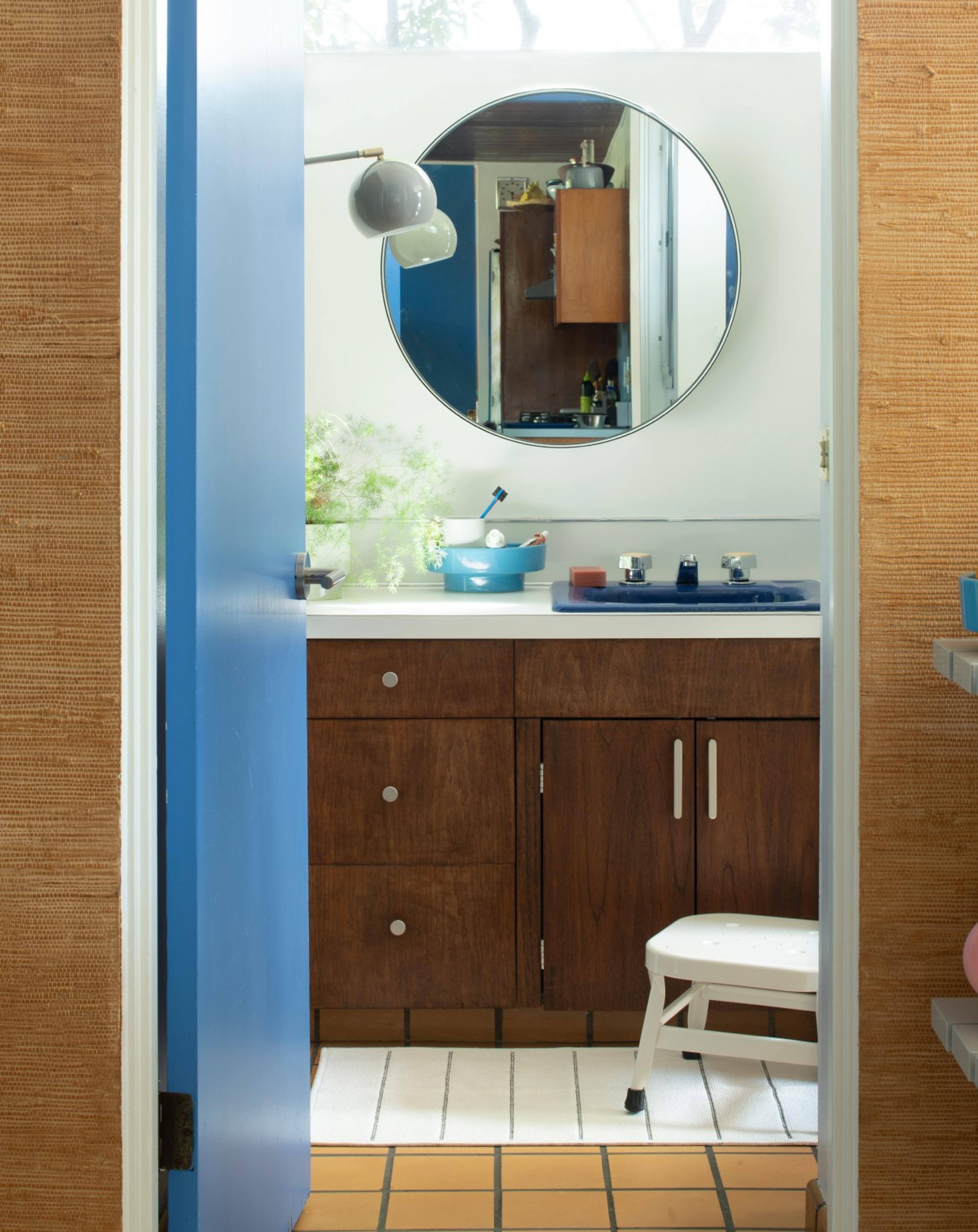 bathroom with blue door