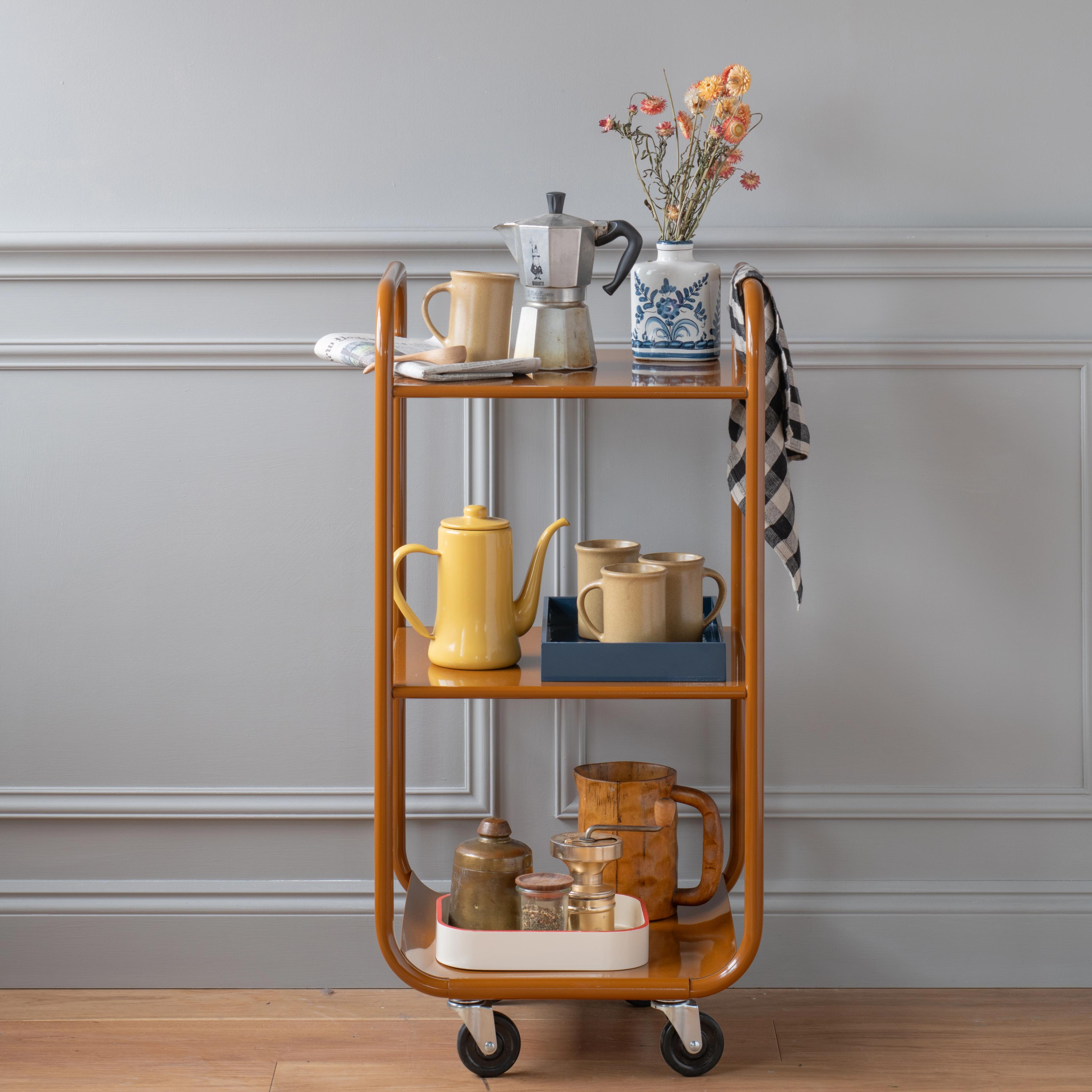 Kitchen cart with french coffee press and serving pitchers 