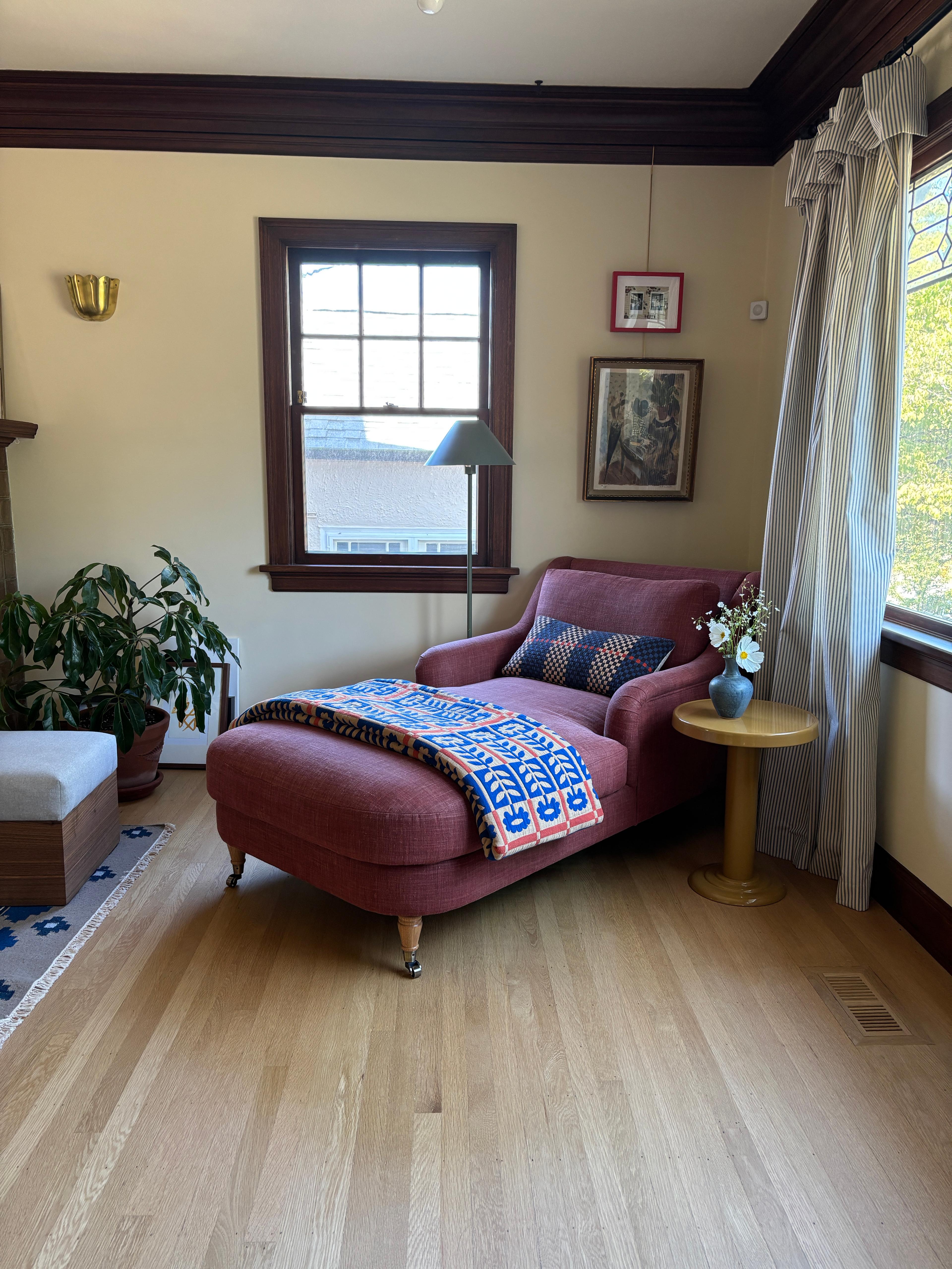 Quilt on chaise.