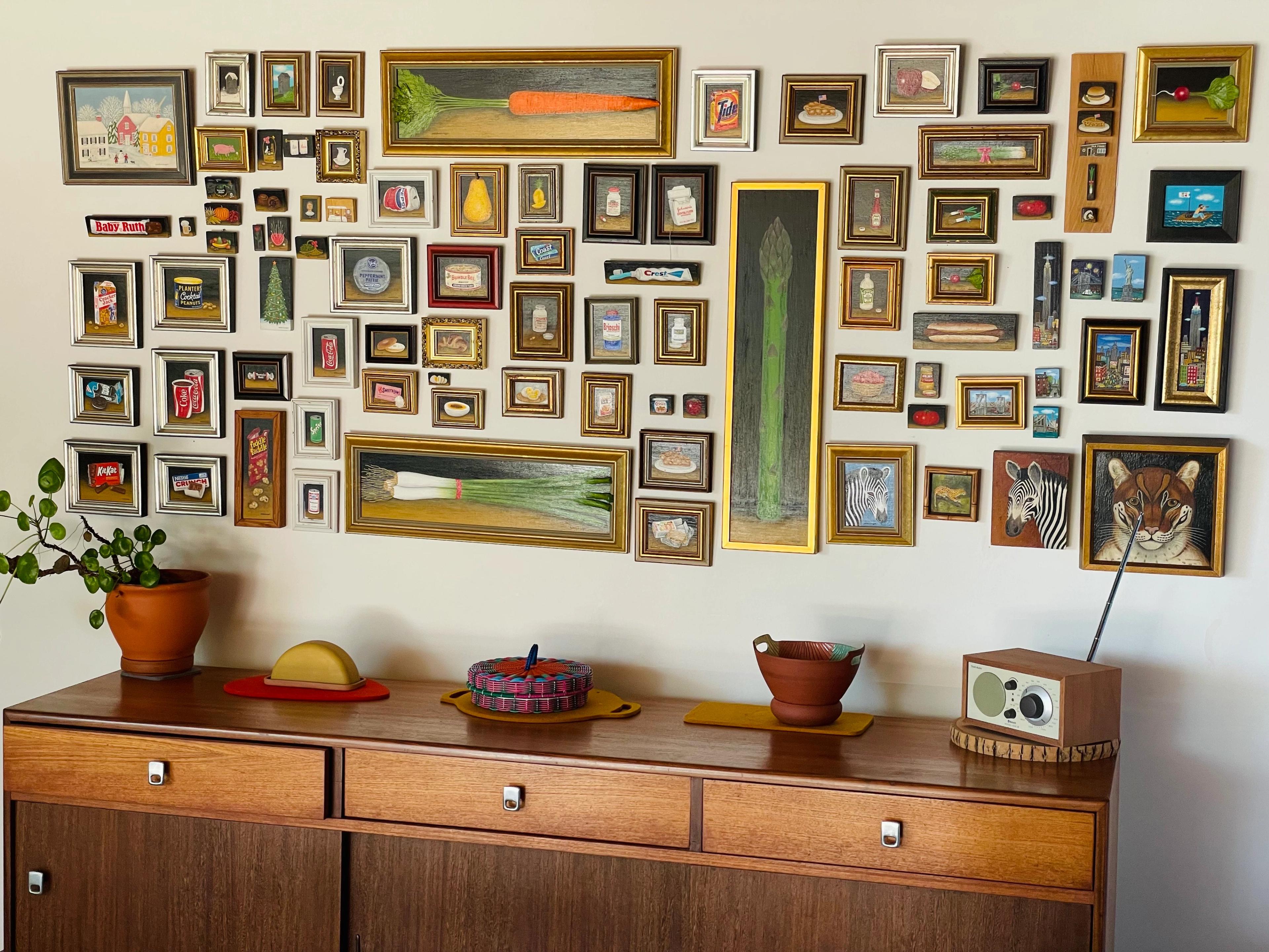 Folk art gallery wall.