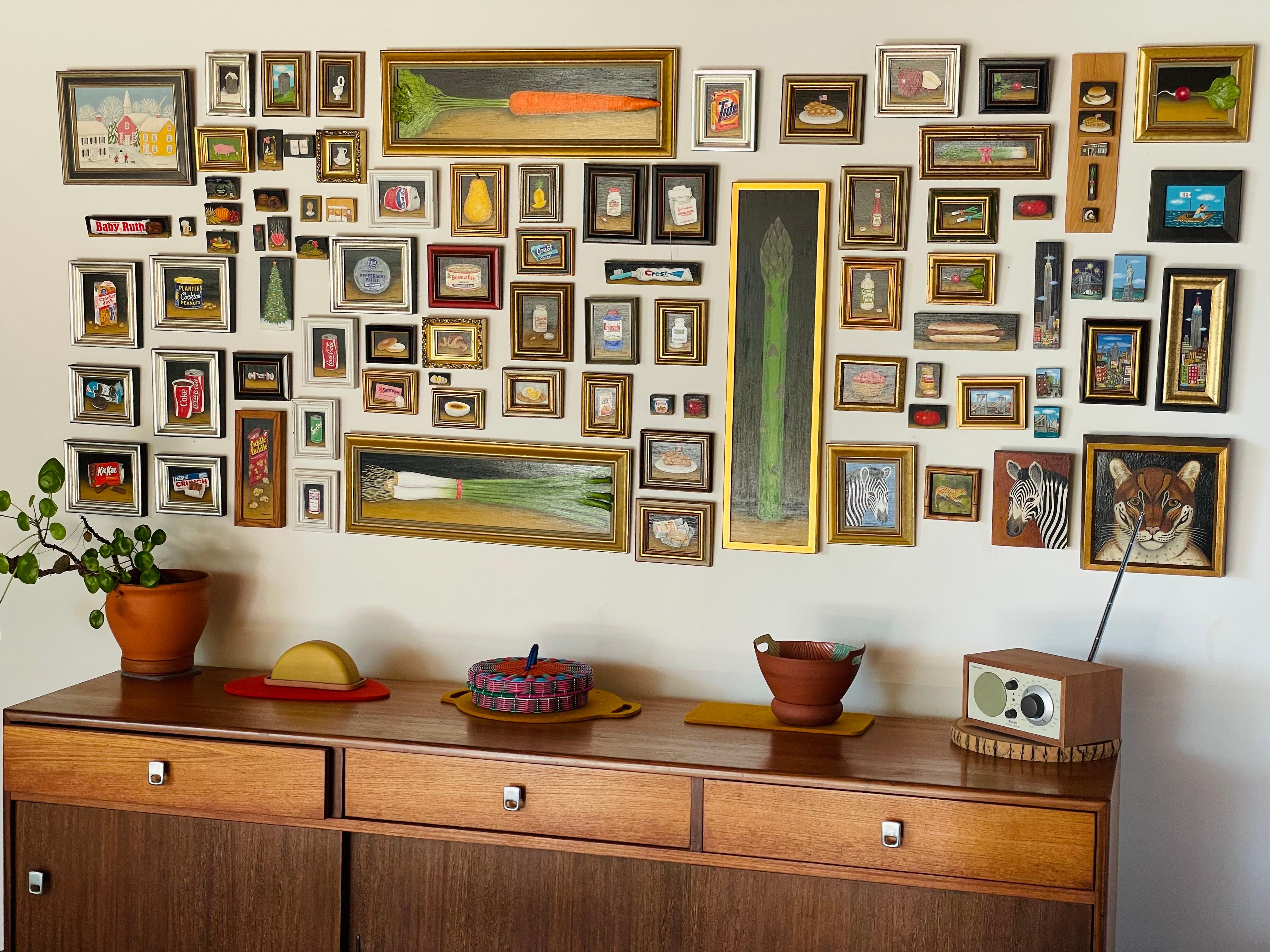 Folk art gallery wall.