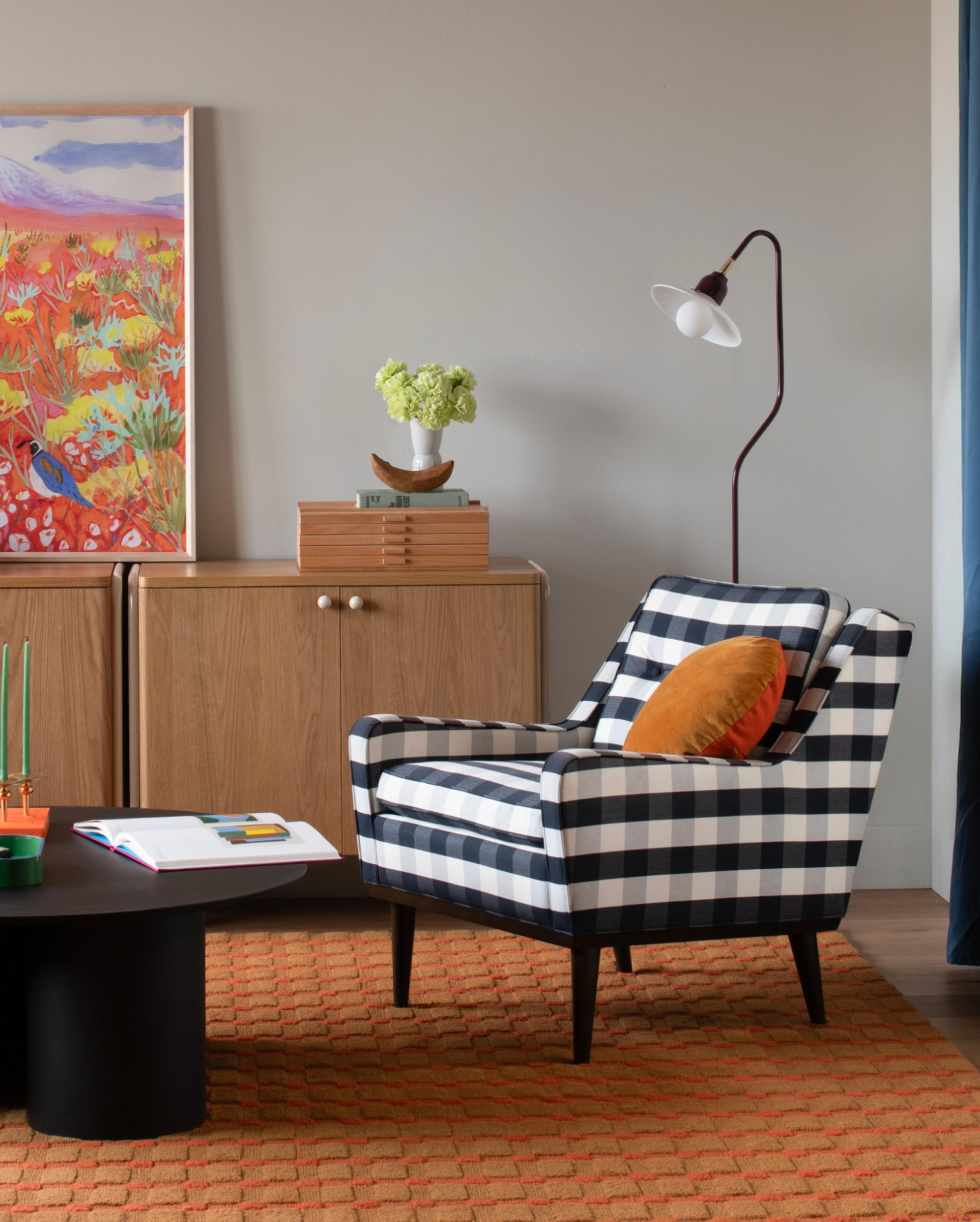 Colorful living room with black and white plaid chair