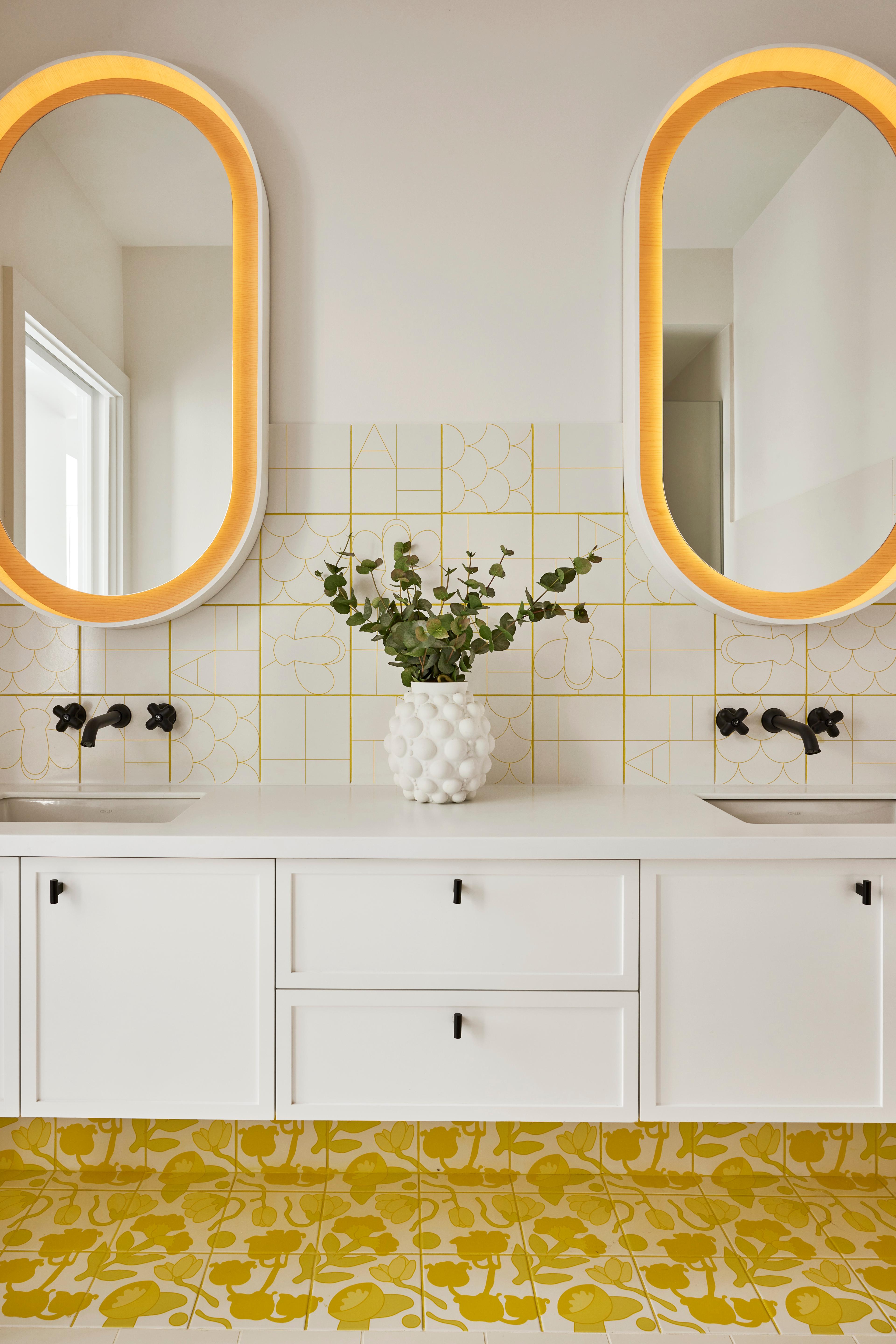 Yellow bathroom with black hardware