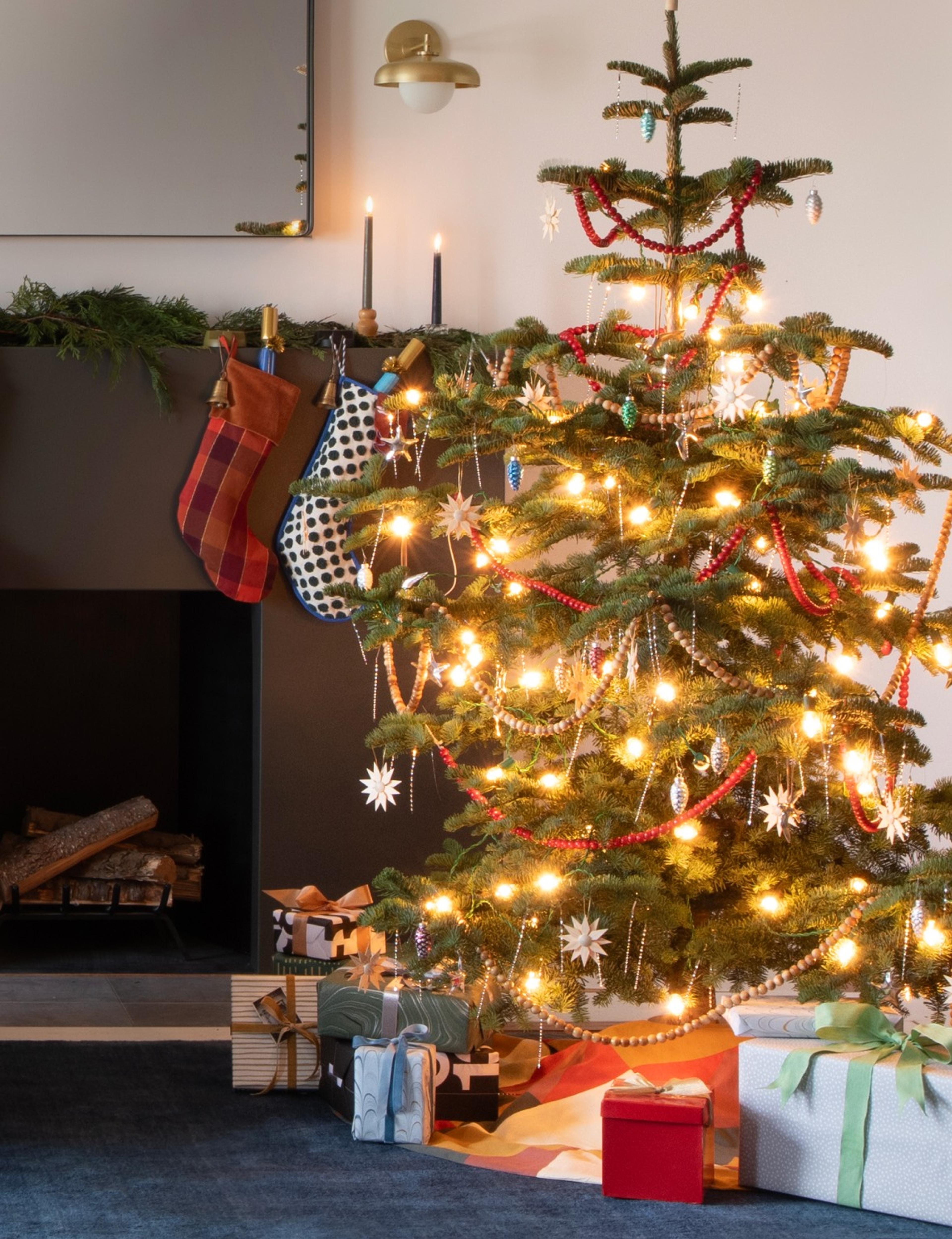 Tree and fireplace decorated for the Holidays 