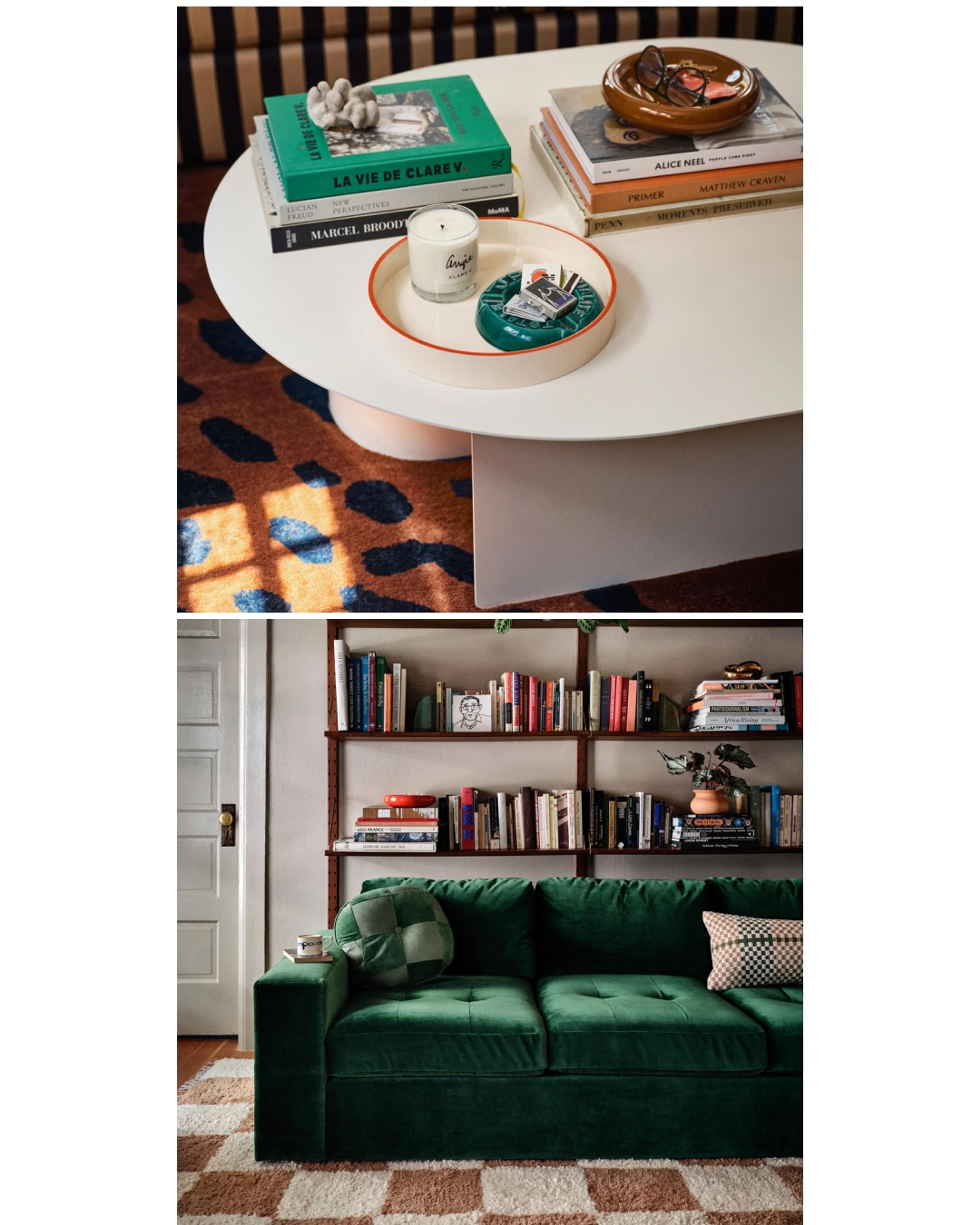 Maximalist living room with green couch and lots of books.