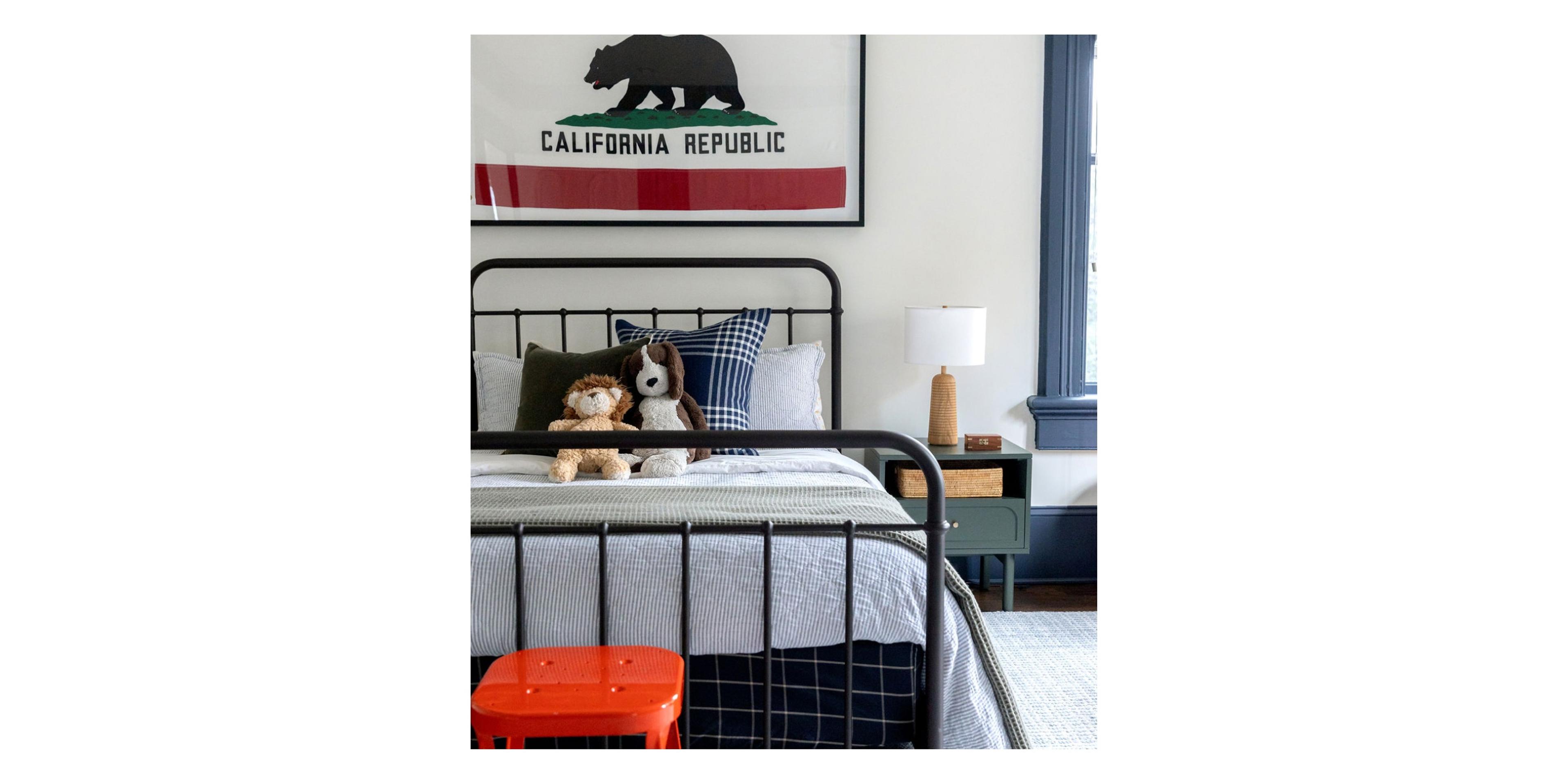 Bed with flag above it.