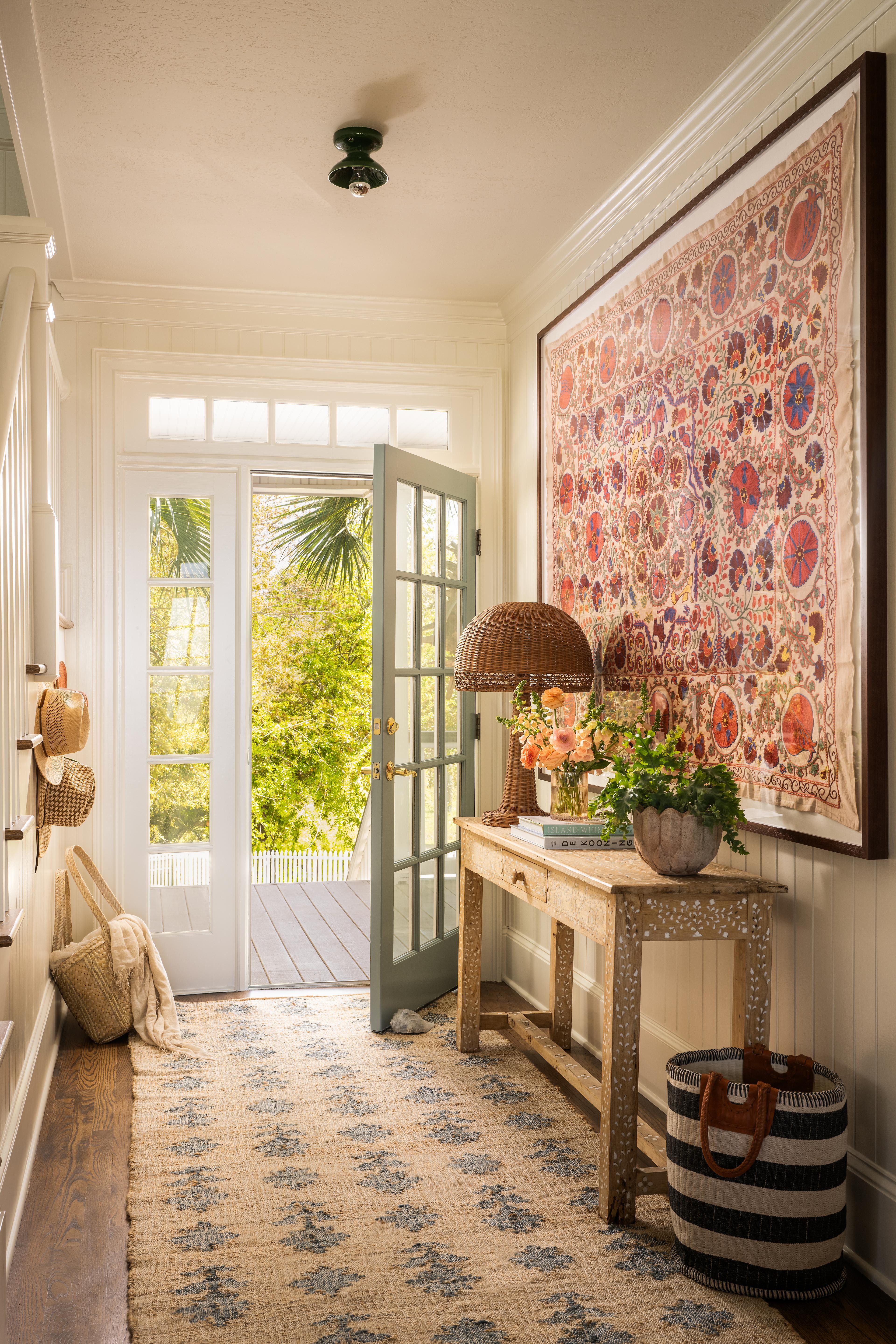 Front Hall with large textile on the wall