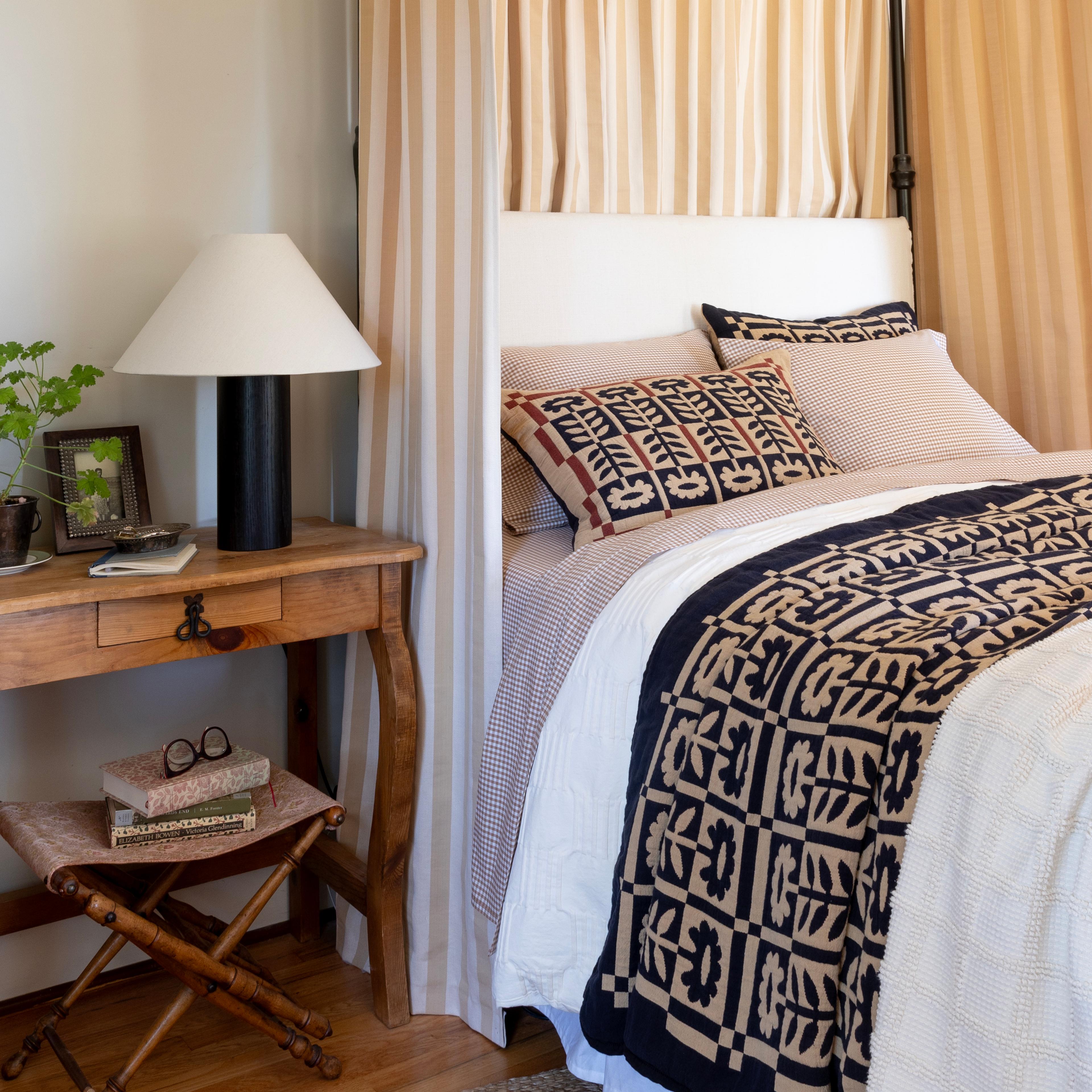 Cozy traditional bed.