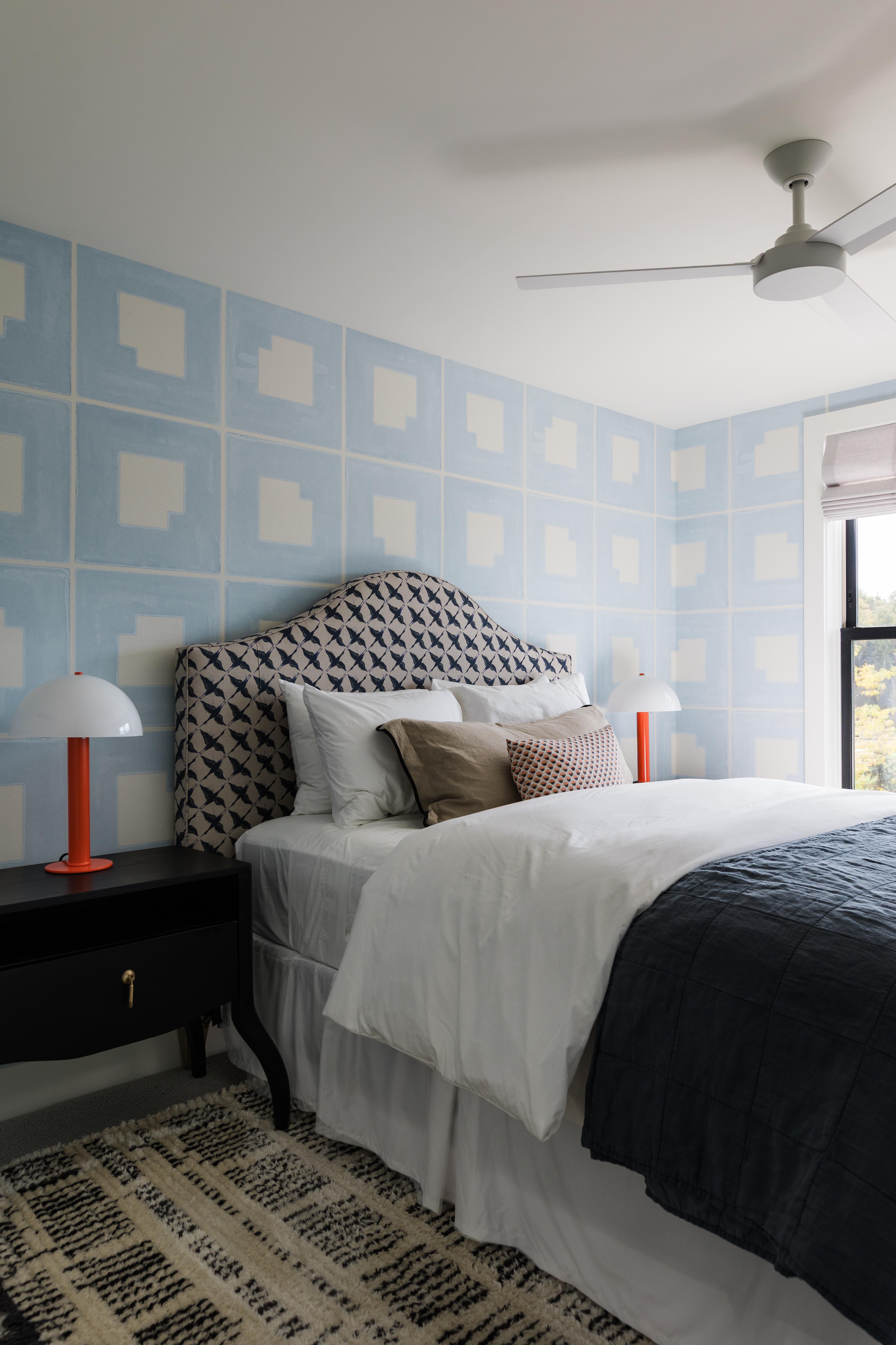 Bedroom with two red lamps