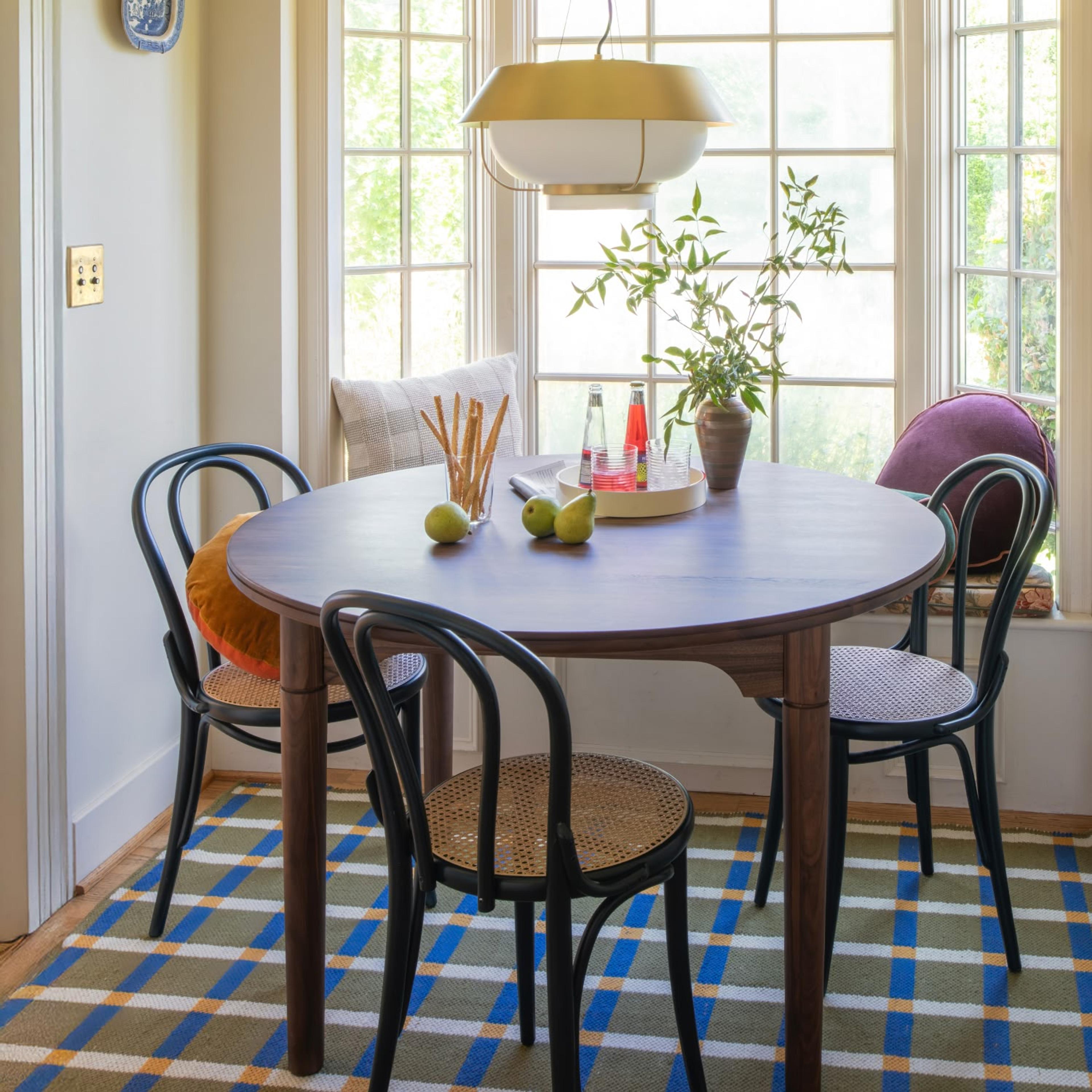 Dining room with walnut dining table and bentwood dining chairs