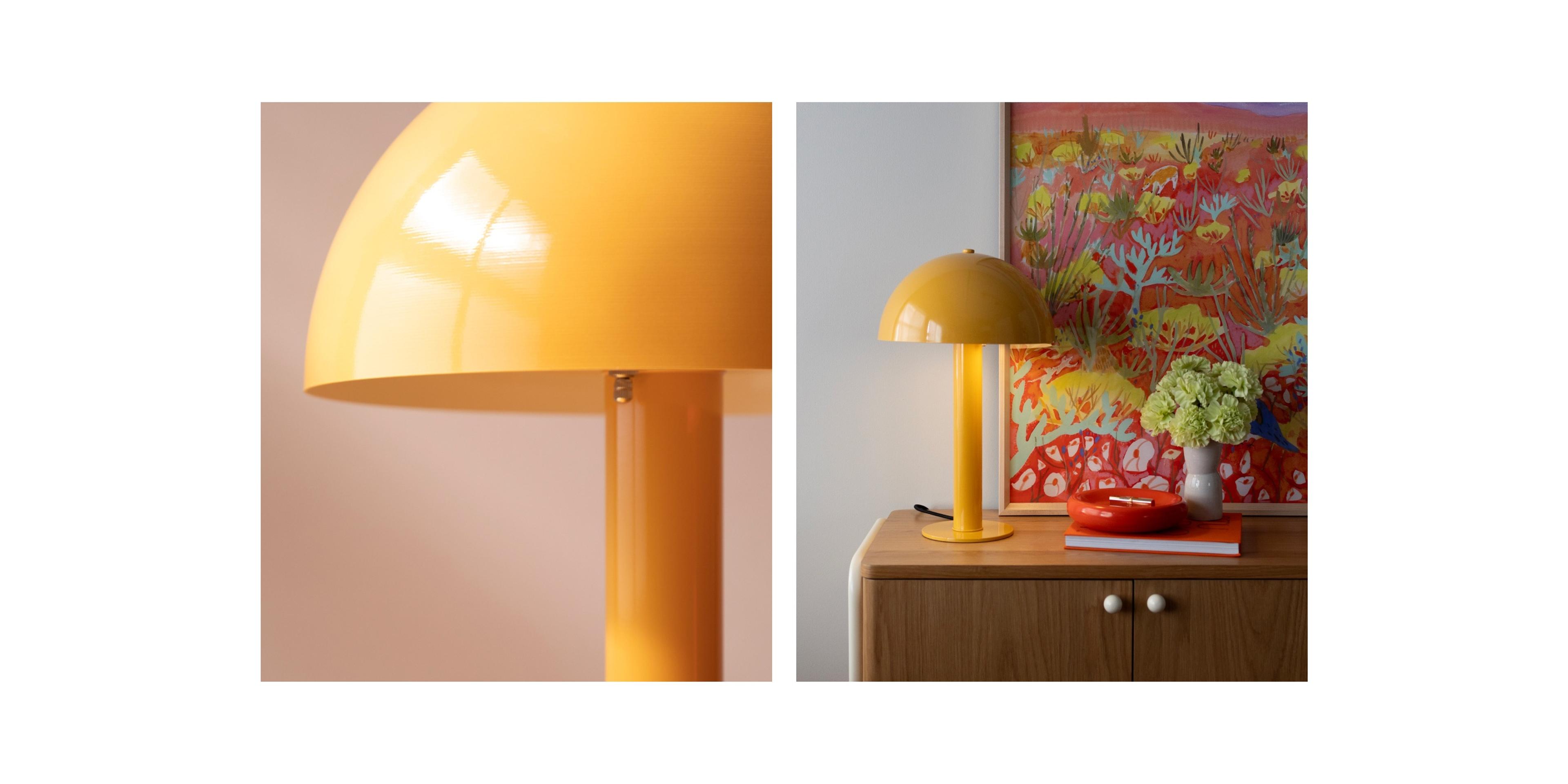Yellow mushroom shaped lamp on corner of dresser next to red metal catch all