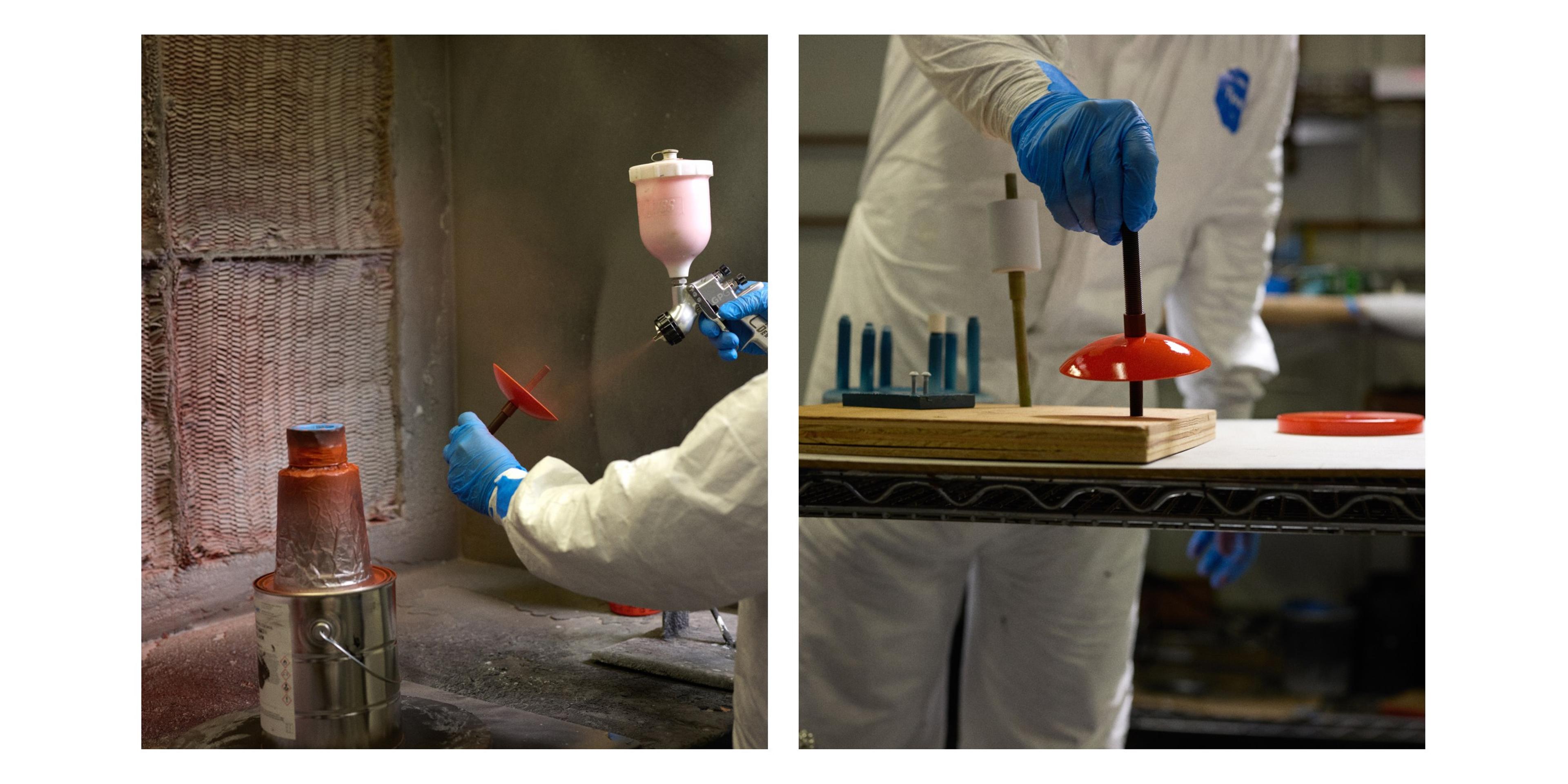 Painter using paint gun to paint lighting fixture pieces red 