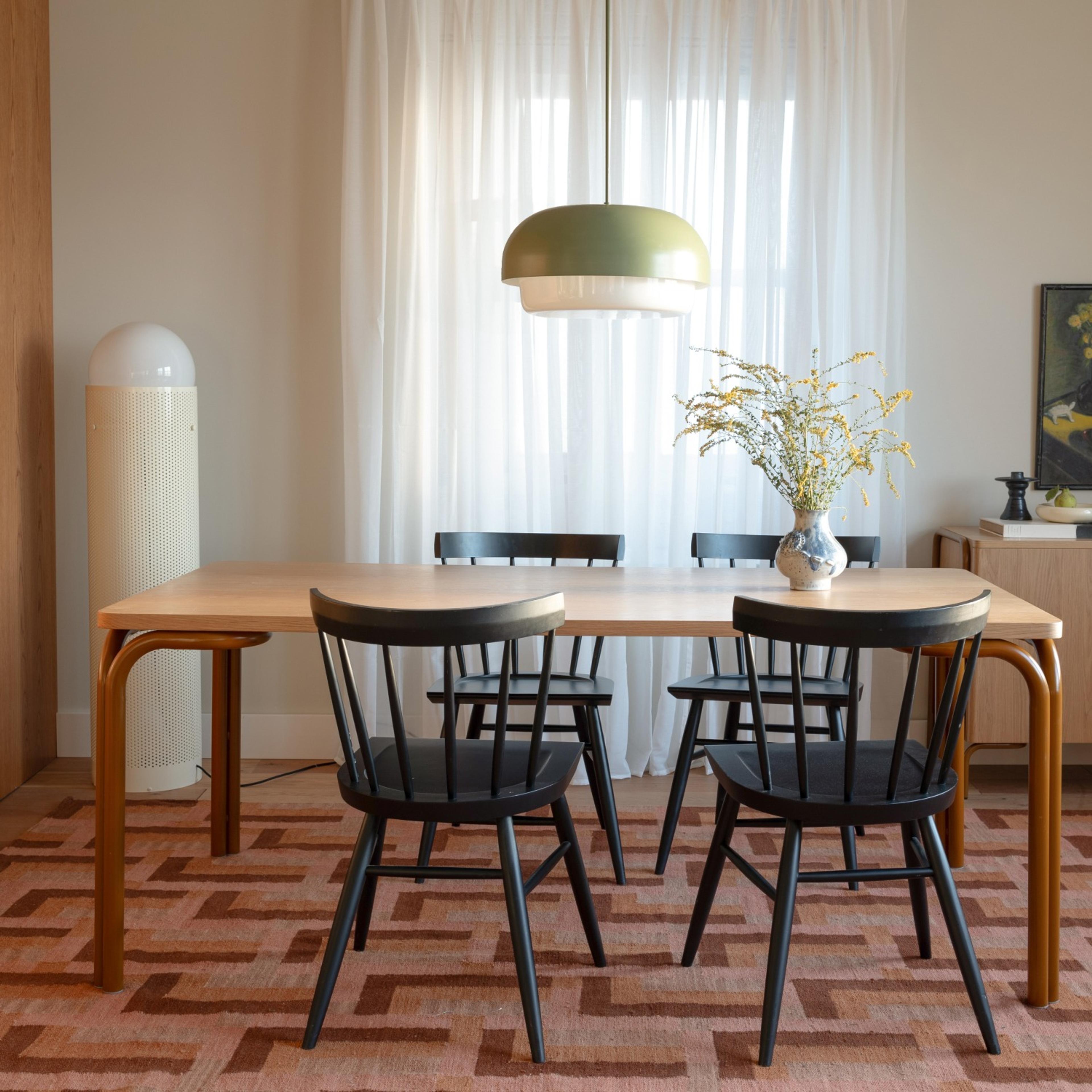 Forma table in a clean bright dining room