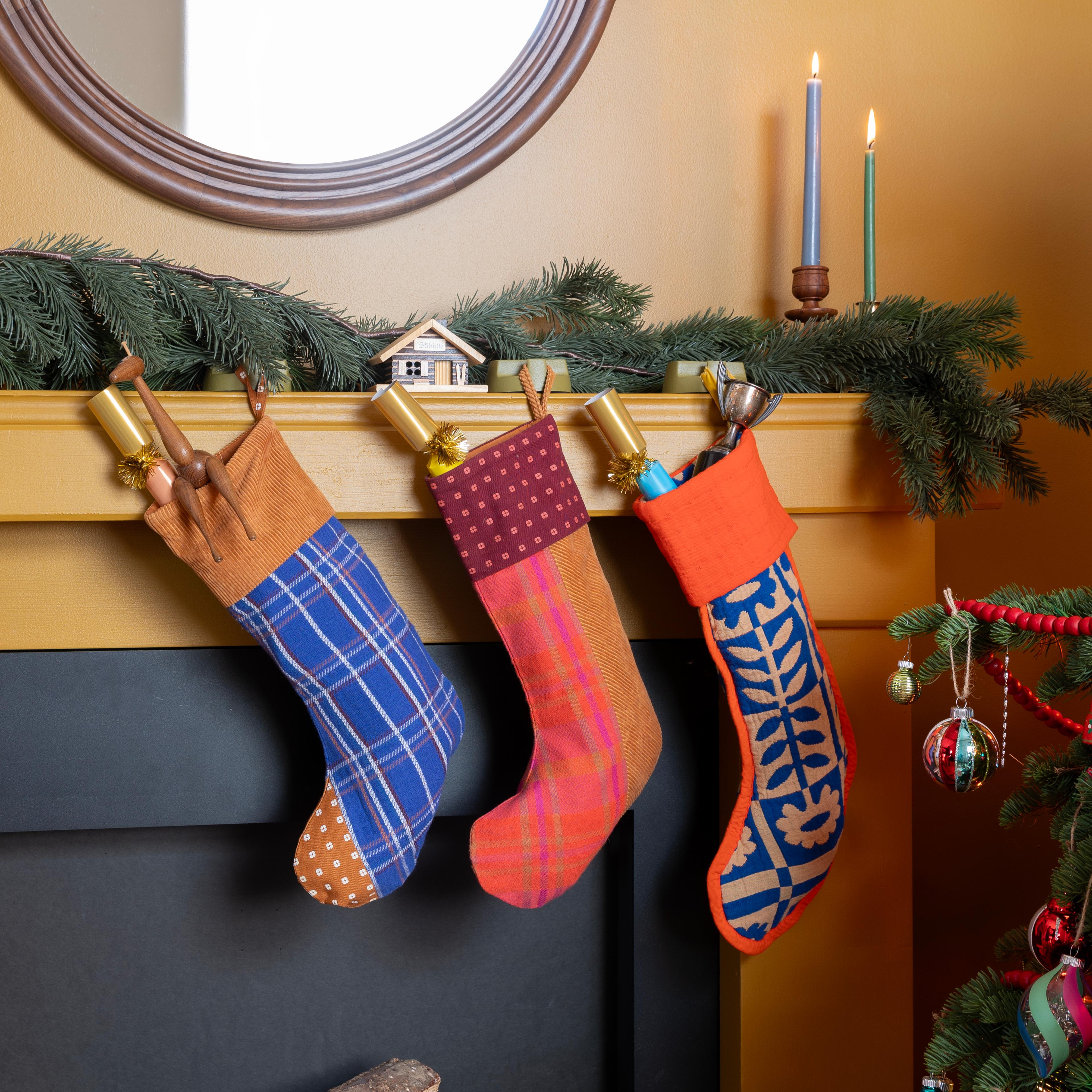 Stockings hanging on a mantle.