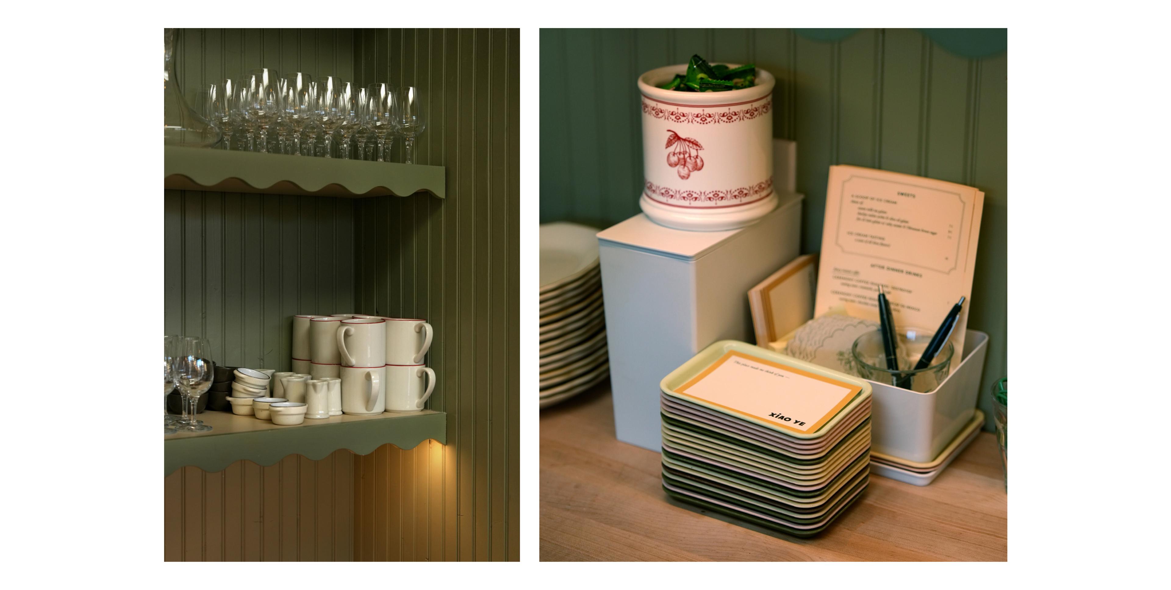 Coffee cups on green shelf and business cards