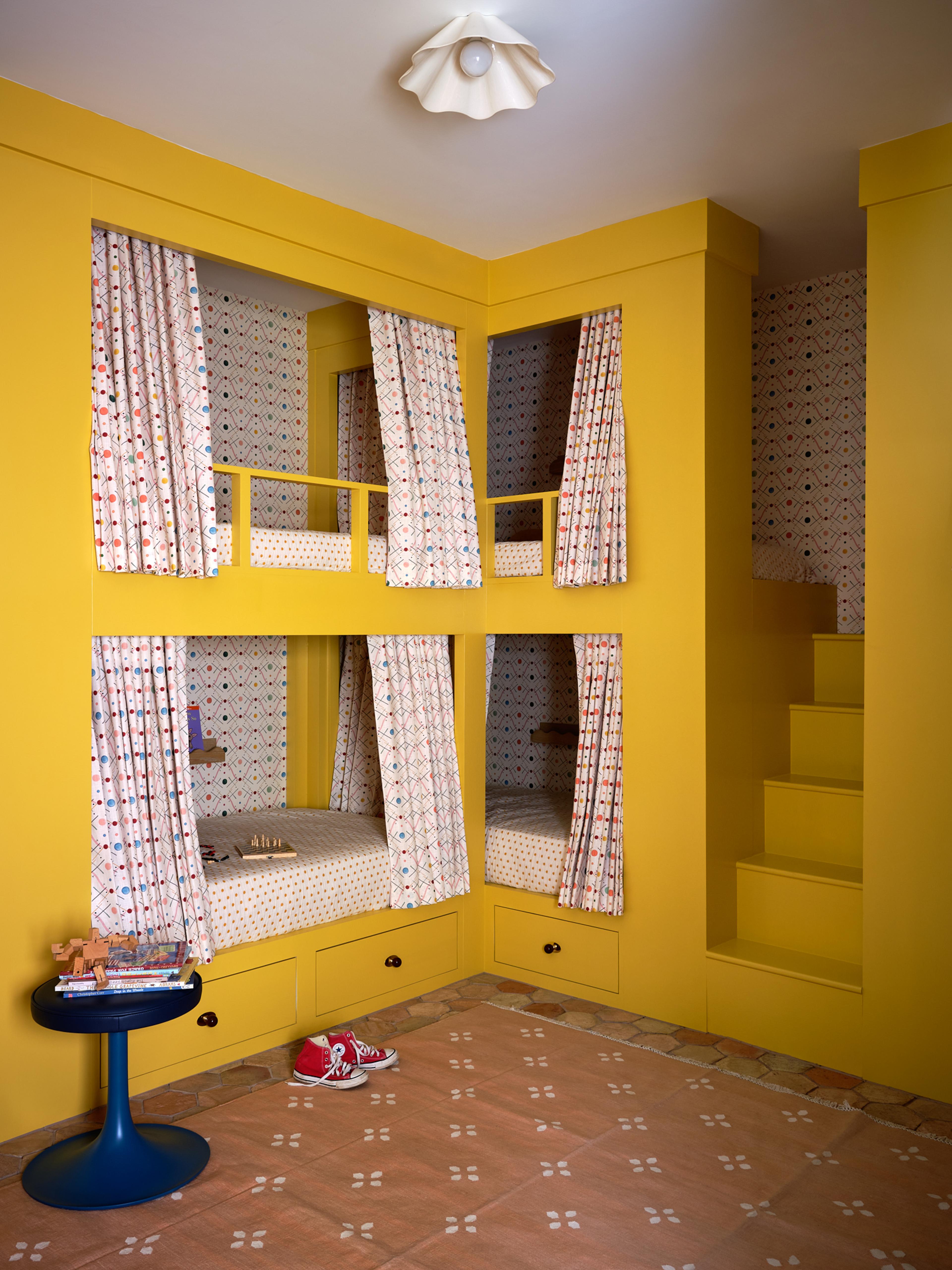 yellow room with bunk beds 