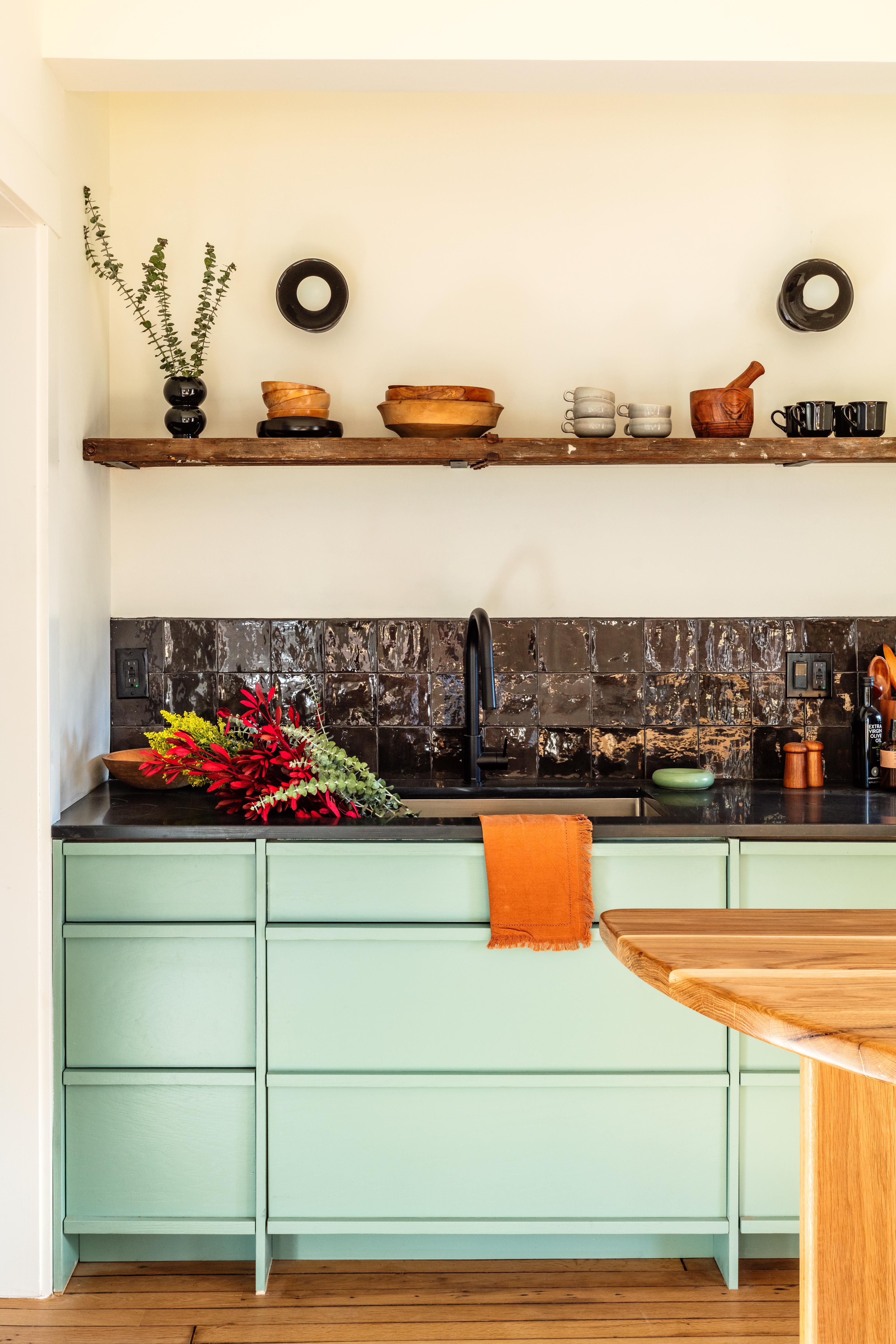 Kitchen with alabax with light blue cabinets 