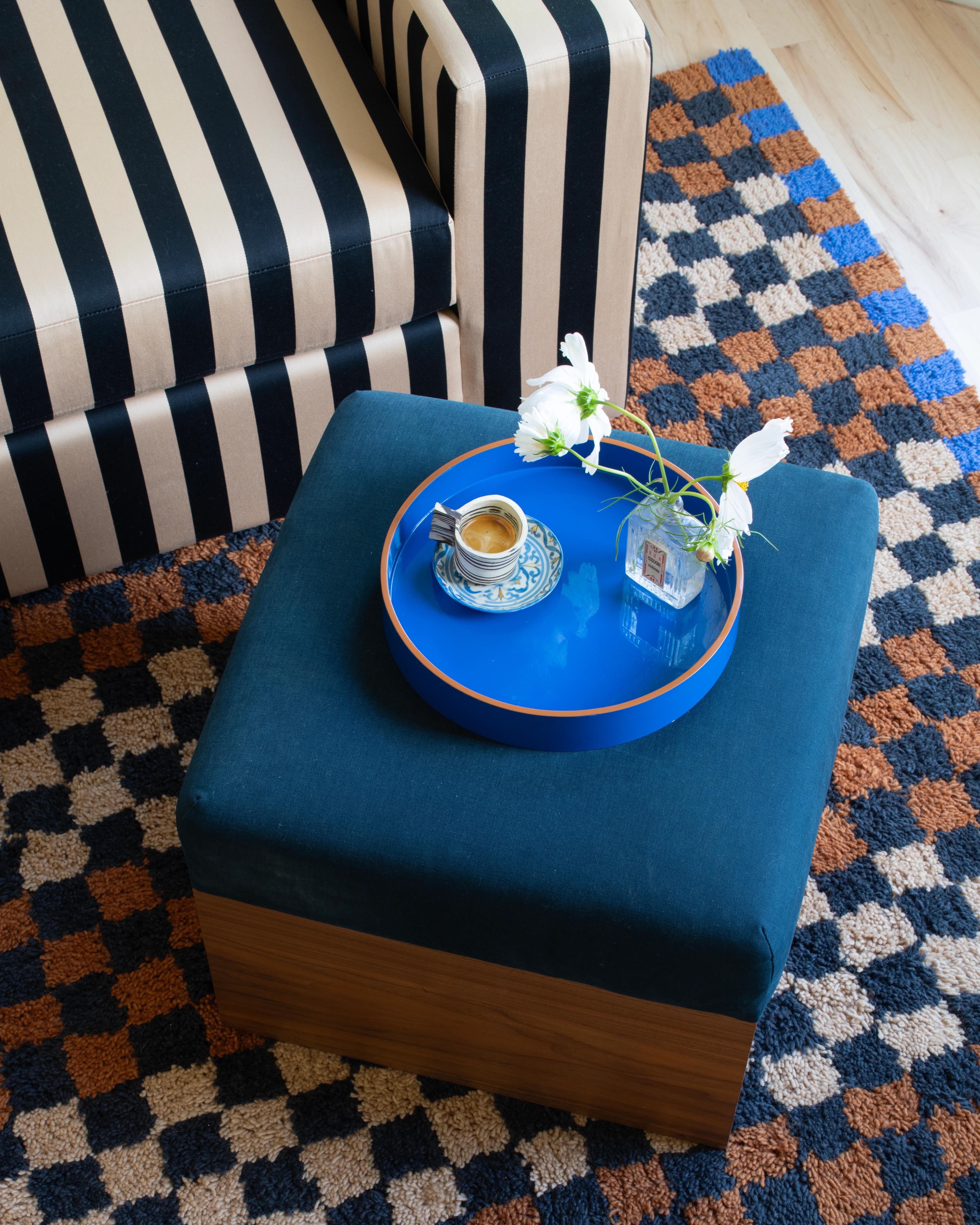 Living room ottoman with decor accents