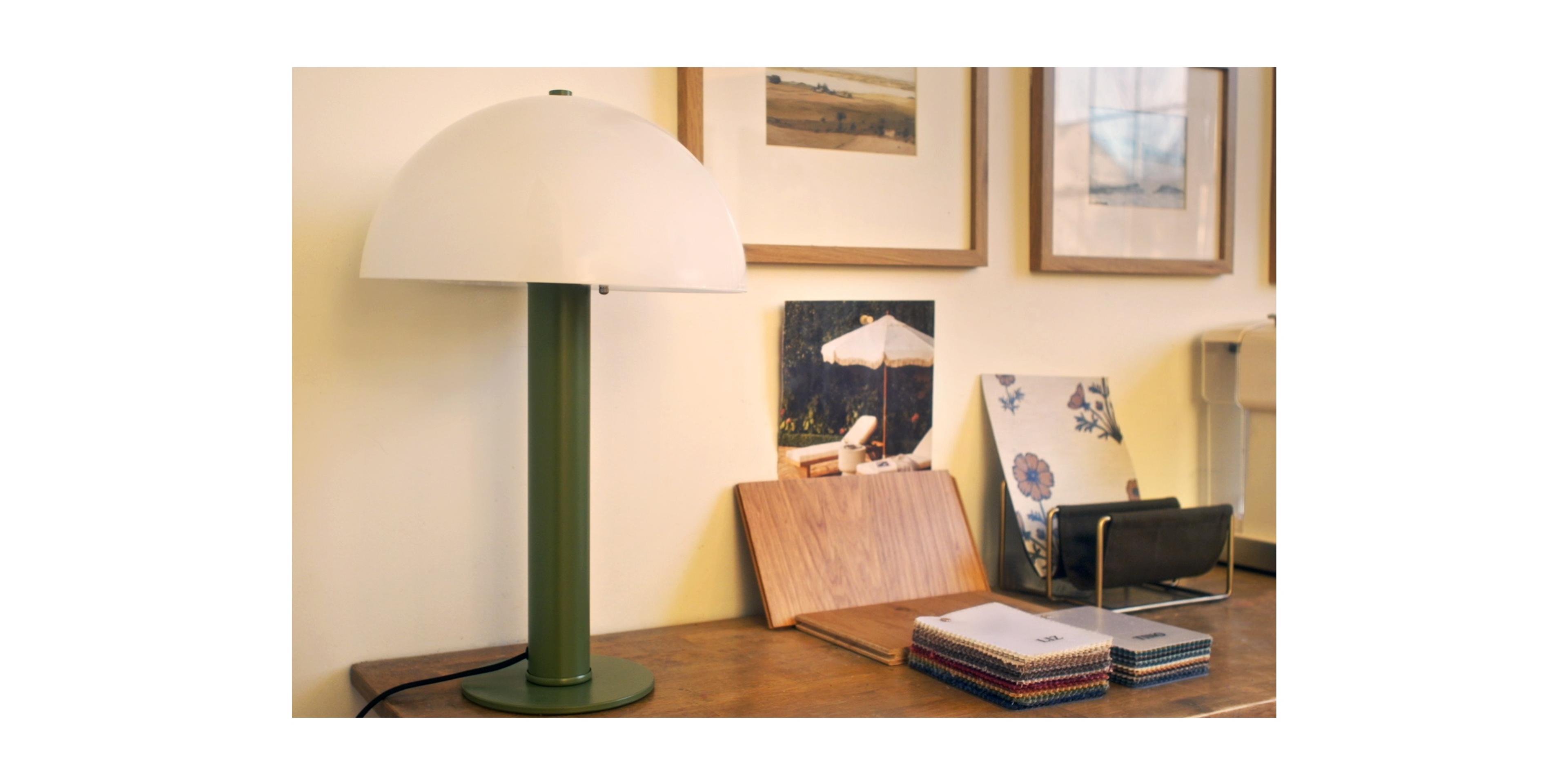 green table lamp with opal shade