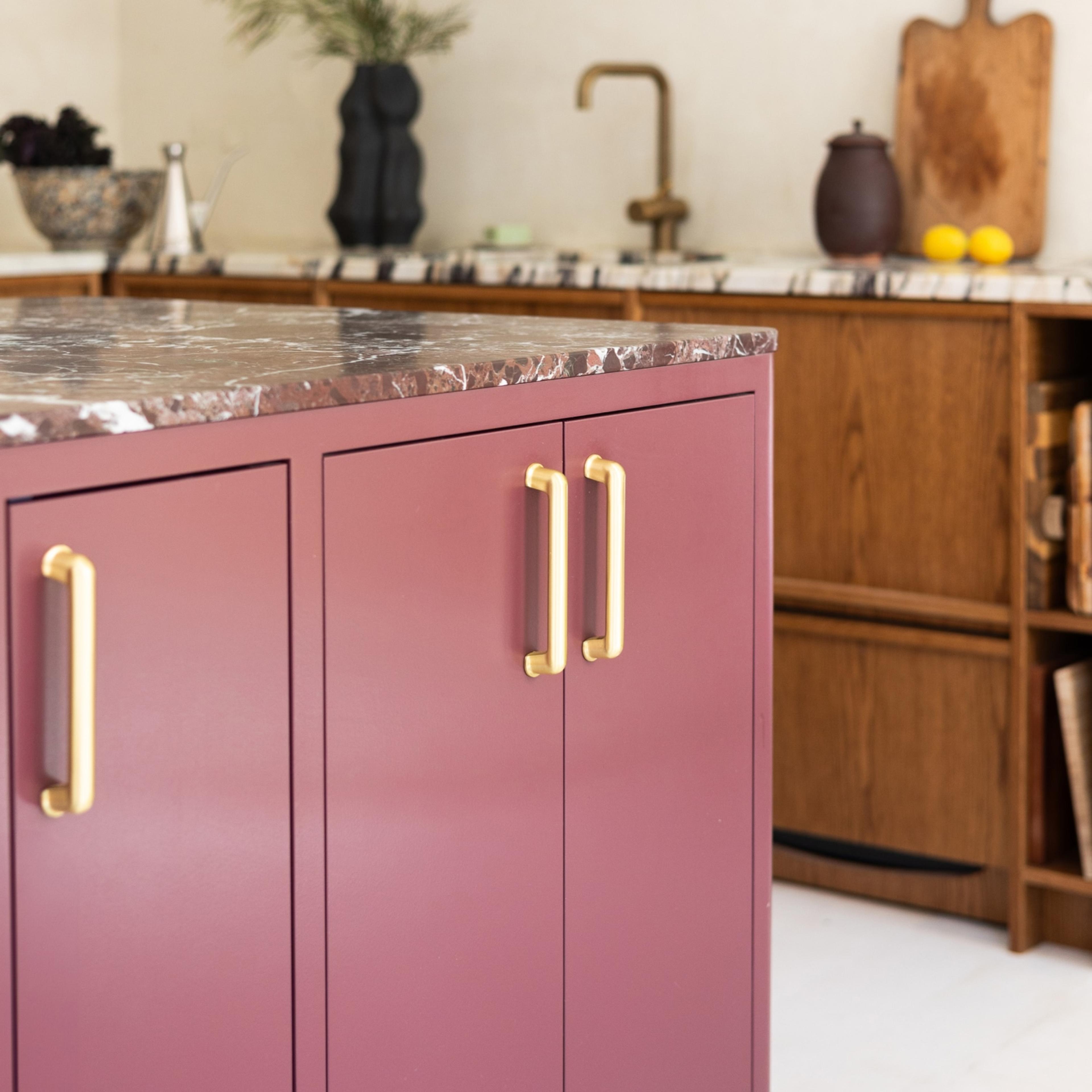 Brass hardware on raisin cabinets