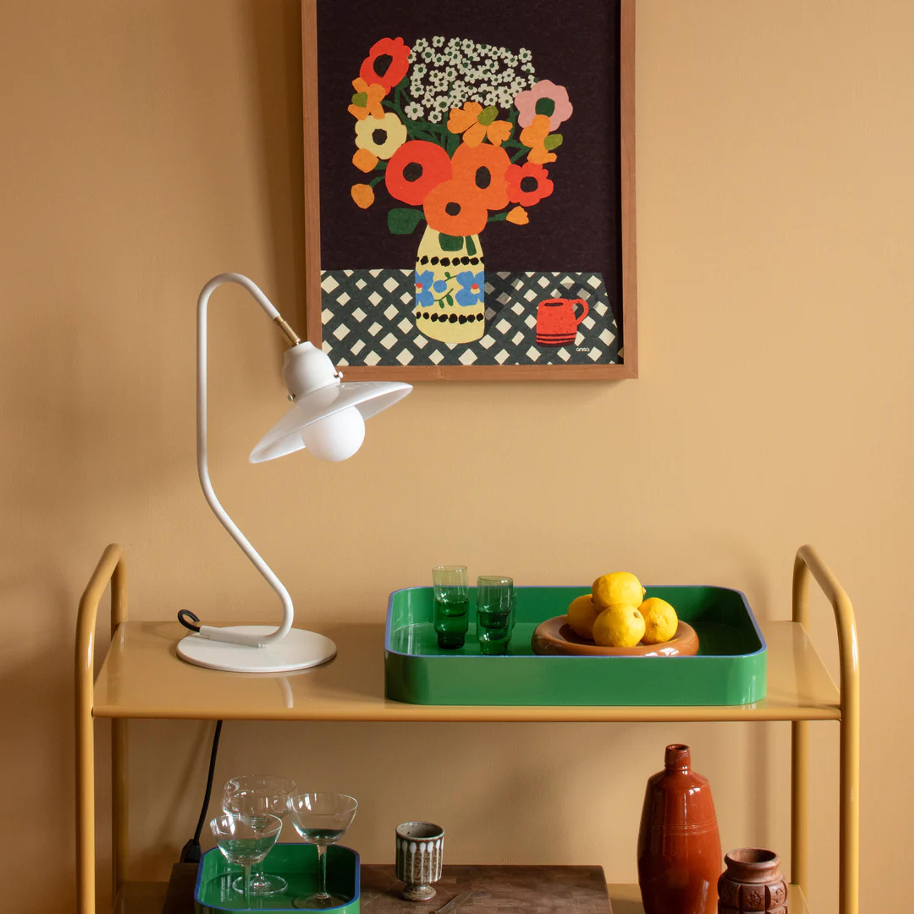 Framed print over a cart.