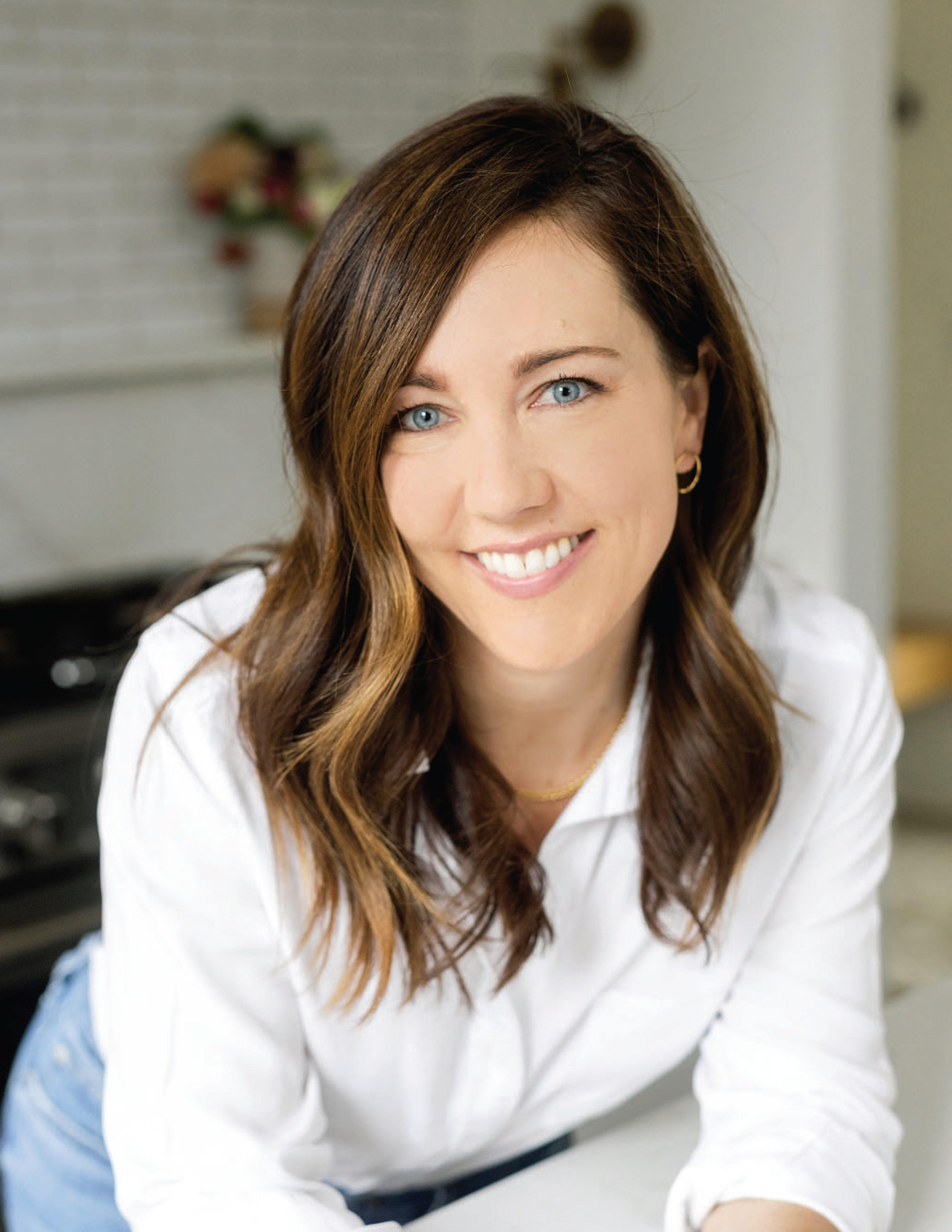 Woman posing and smiling.