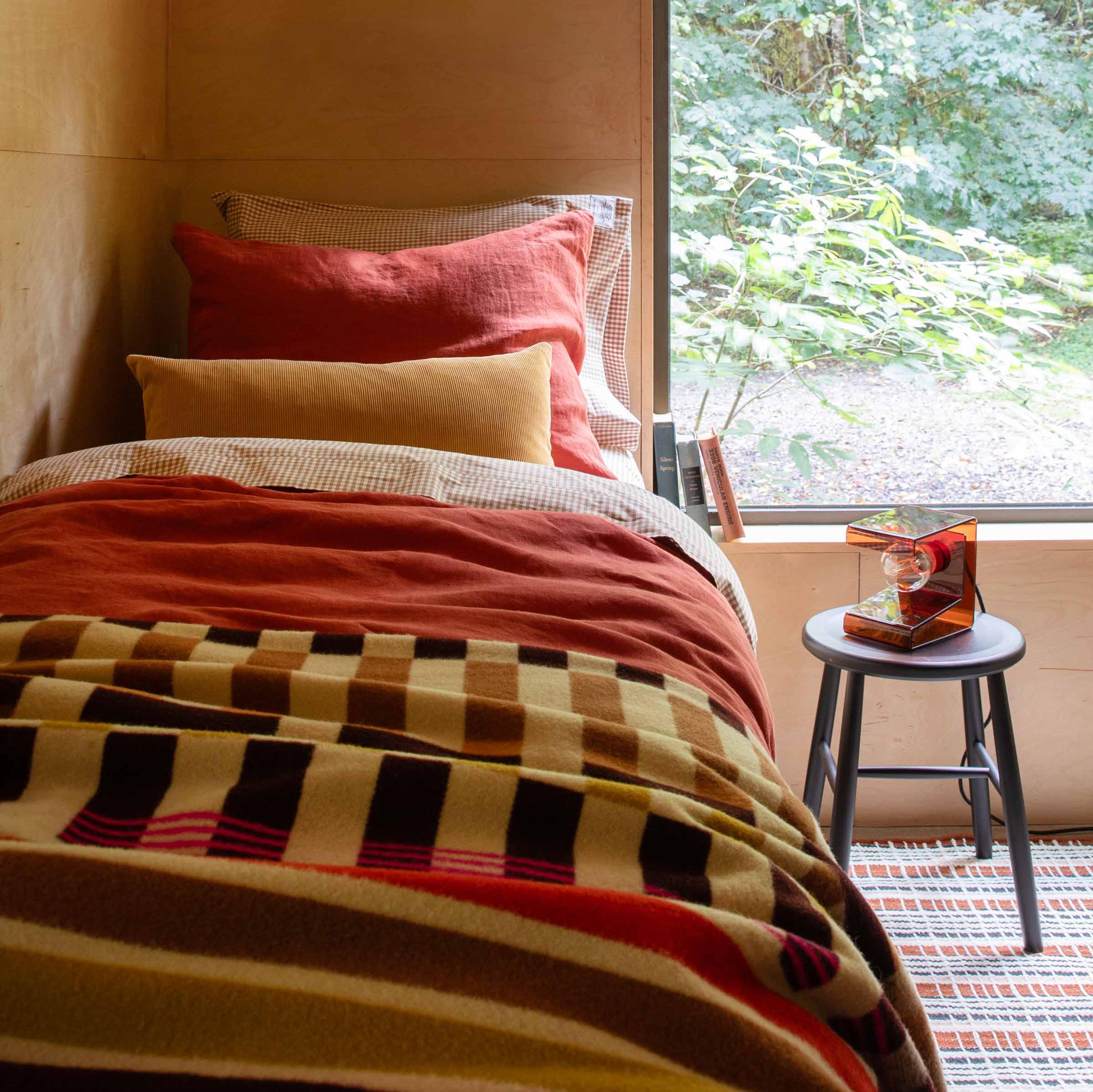 A cozy fall bed. 