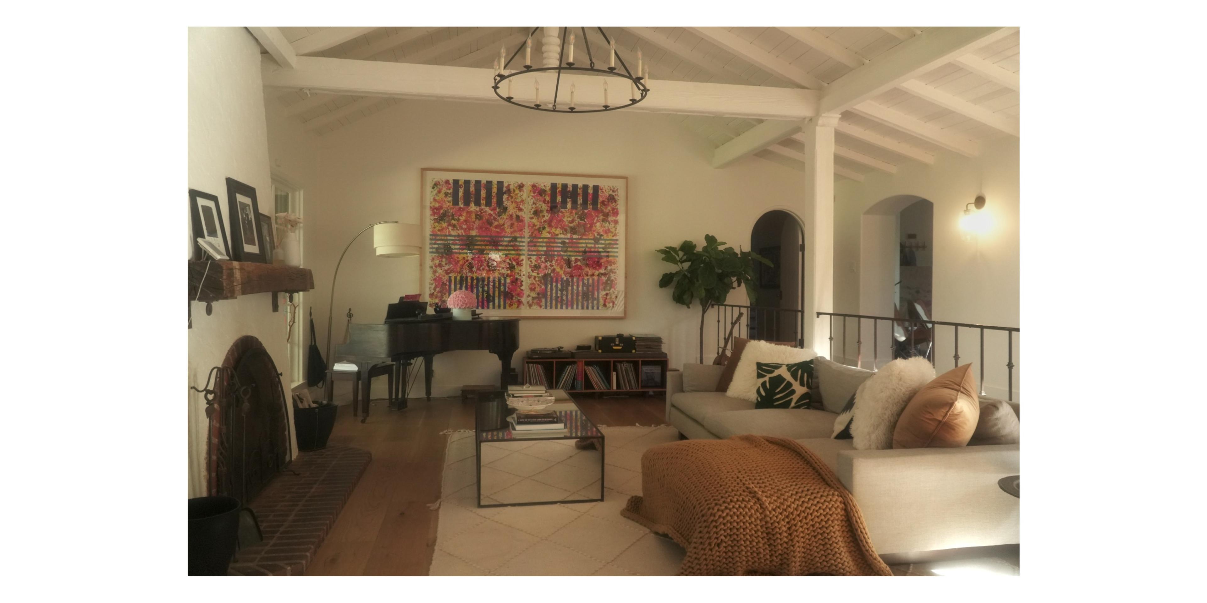 stylish open space living room with piano in the corner