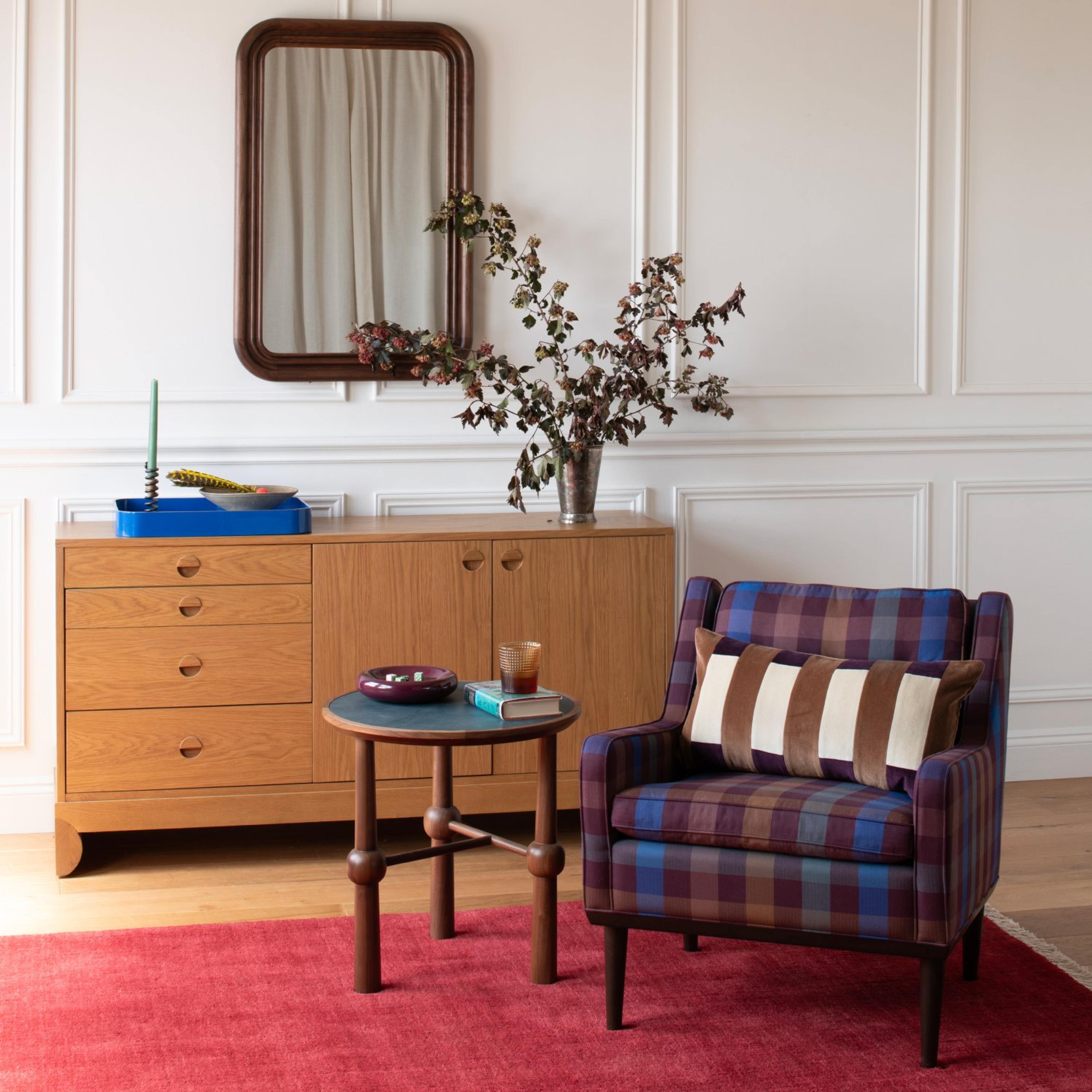Jack chair with raisin upholstery and Ann occasional table