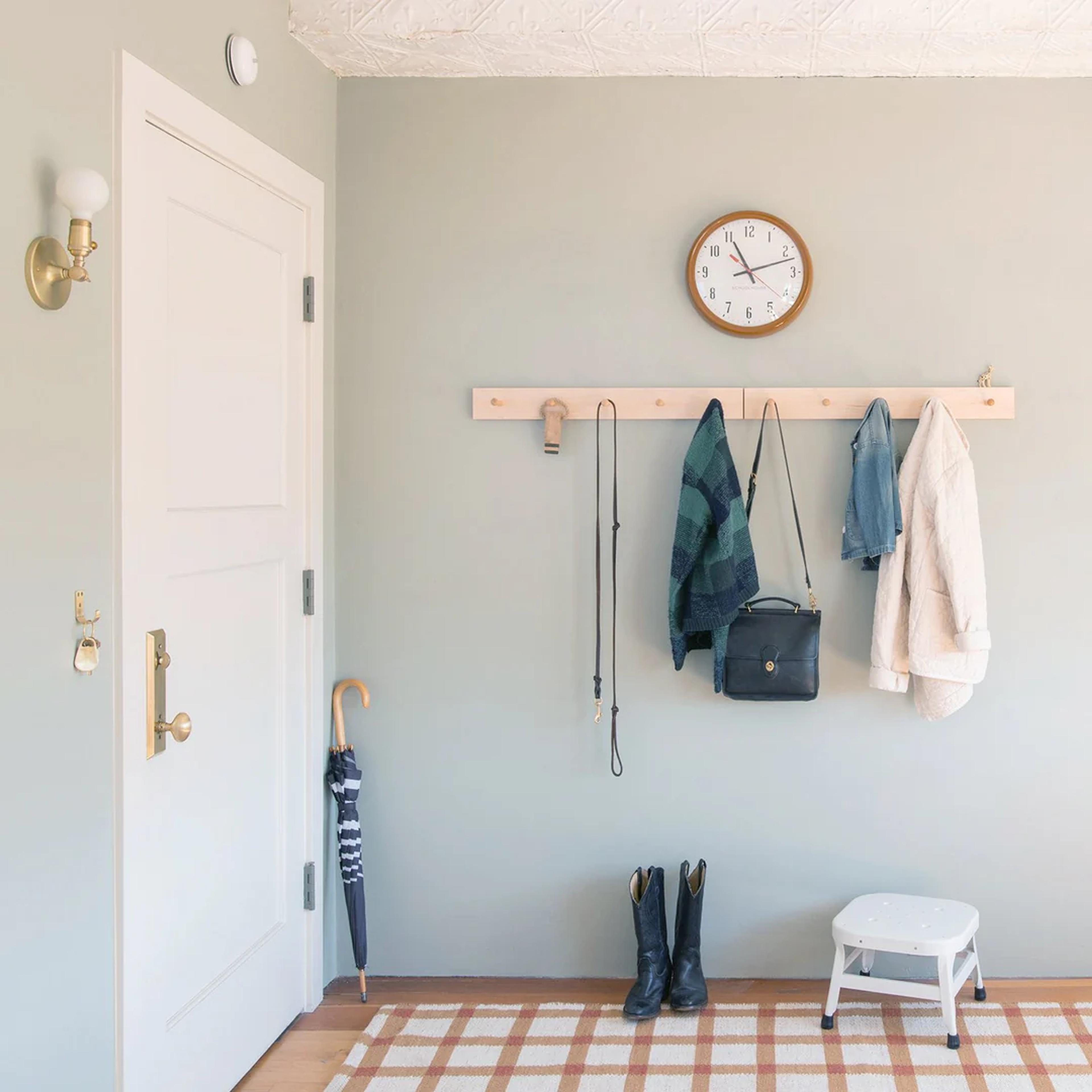 Peg rail on wall.