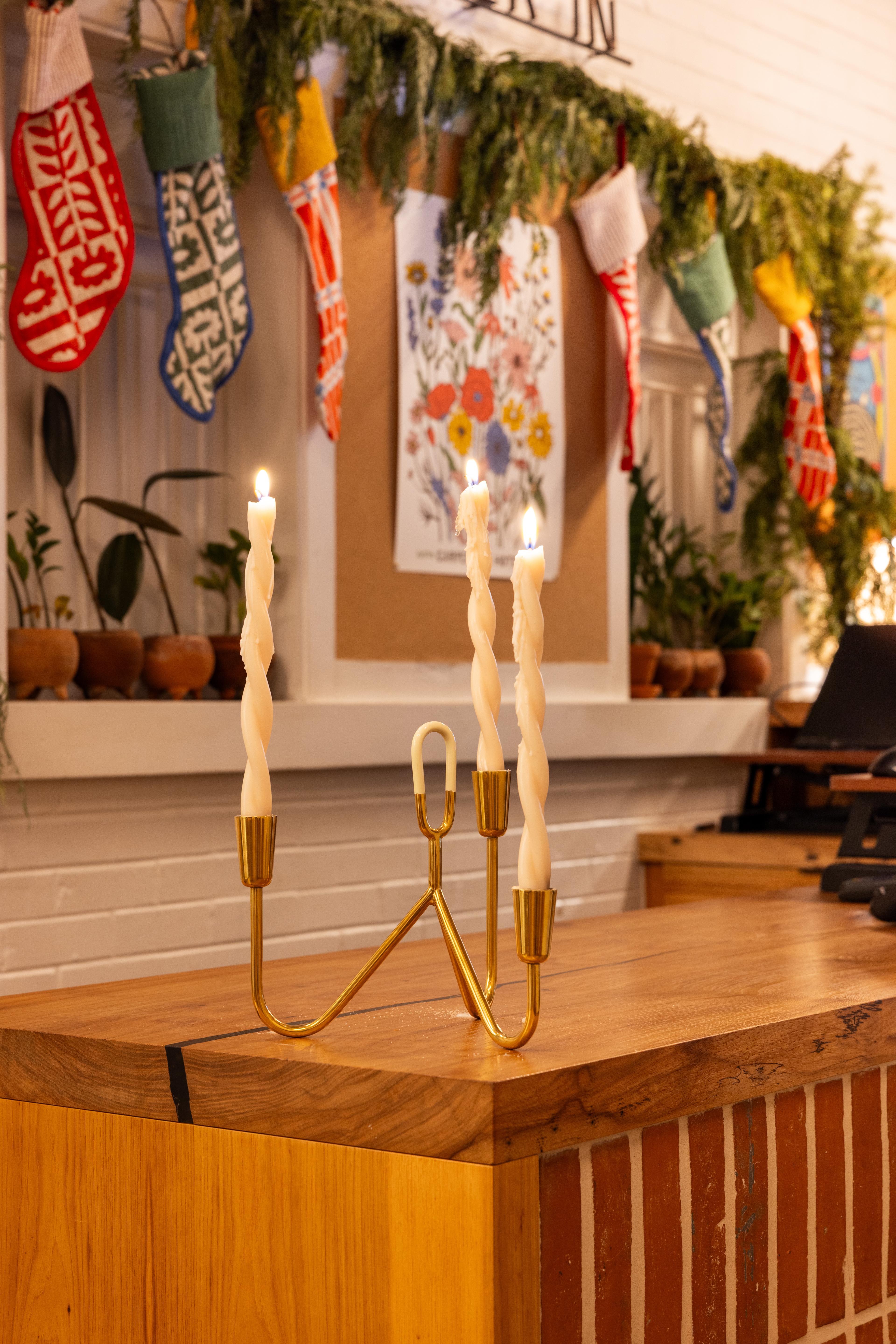 Candelabra on front desk.