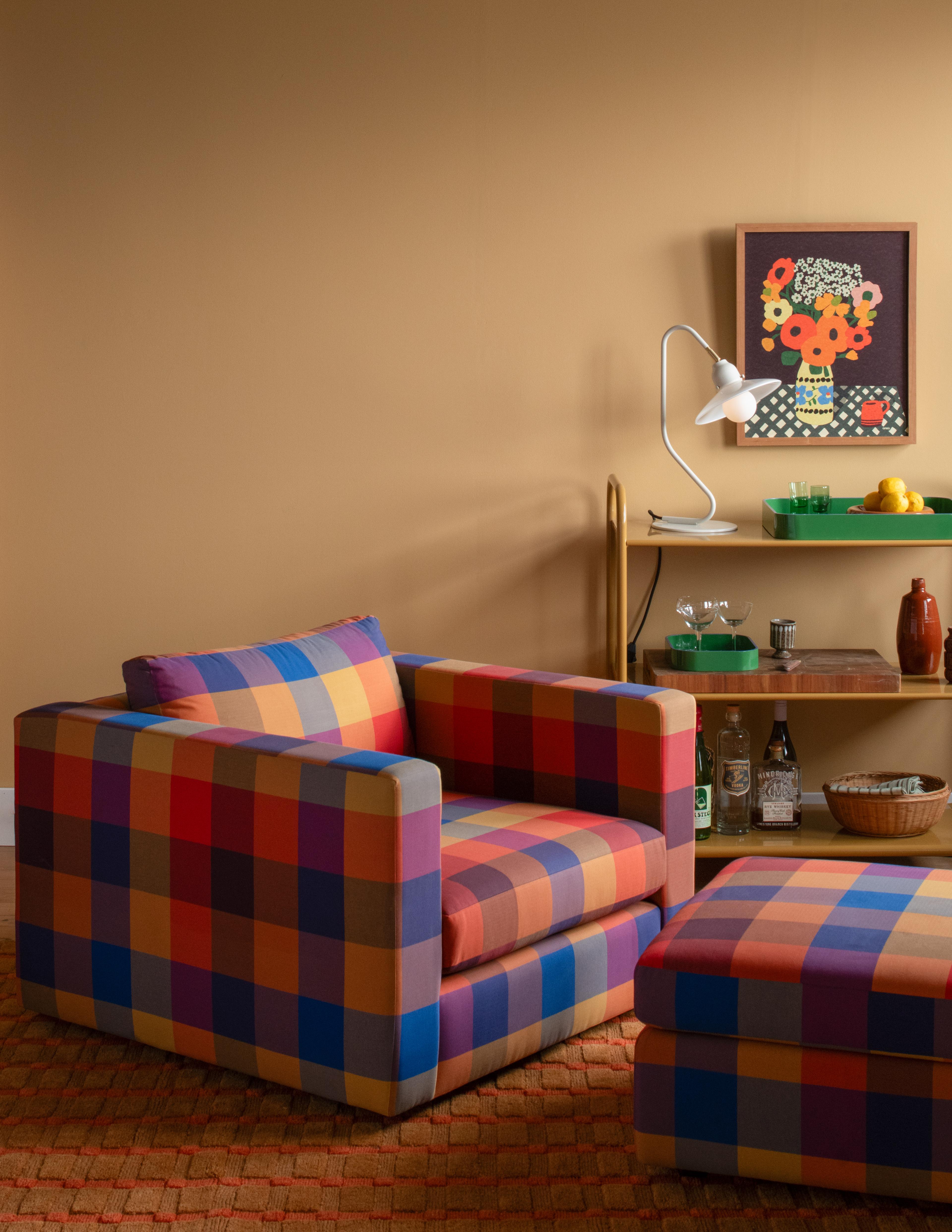 Mustard wall with chair. 
