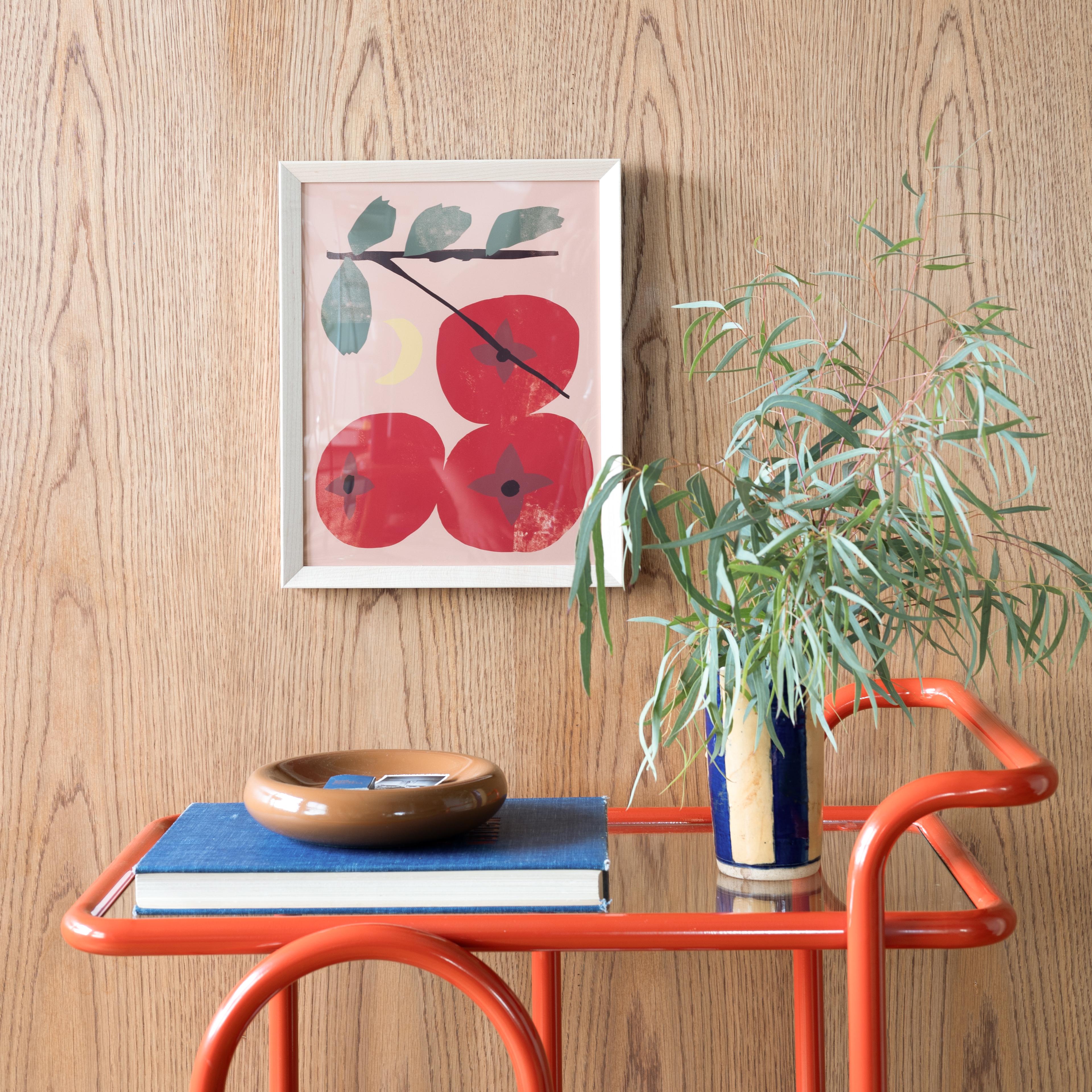 Cherry print above red bar cart