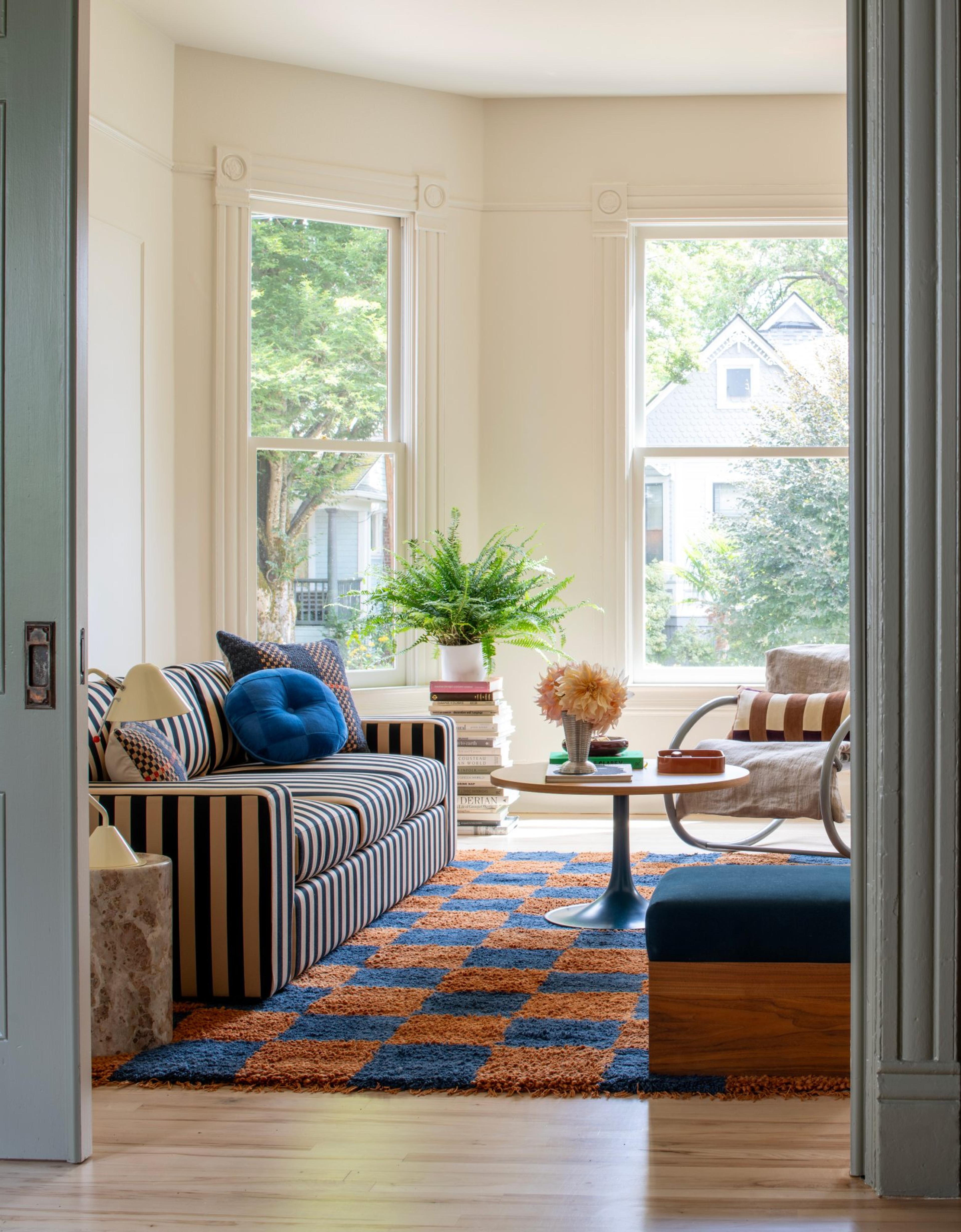 bright living room with Clare V Marc Sofa and Jacques Rug