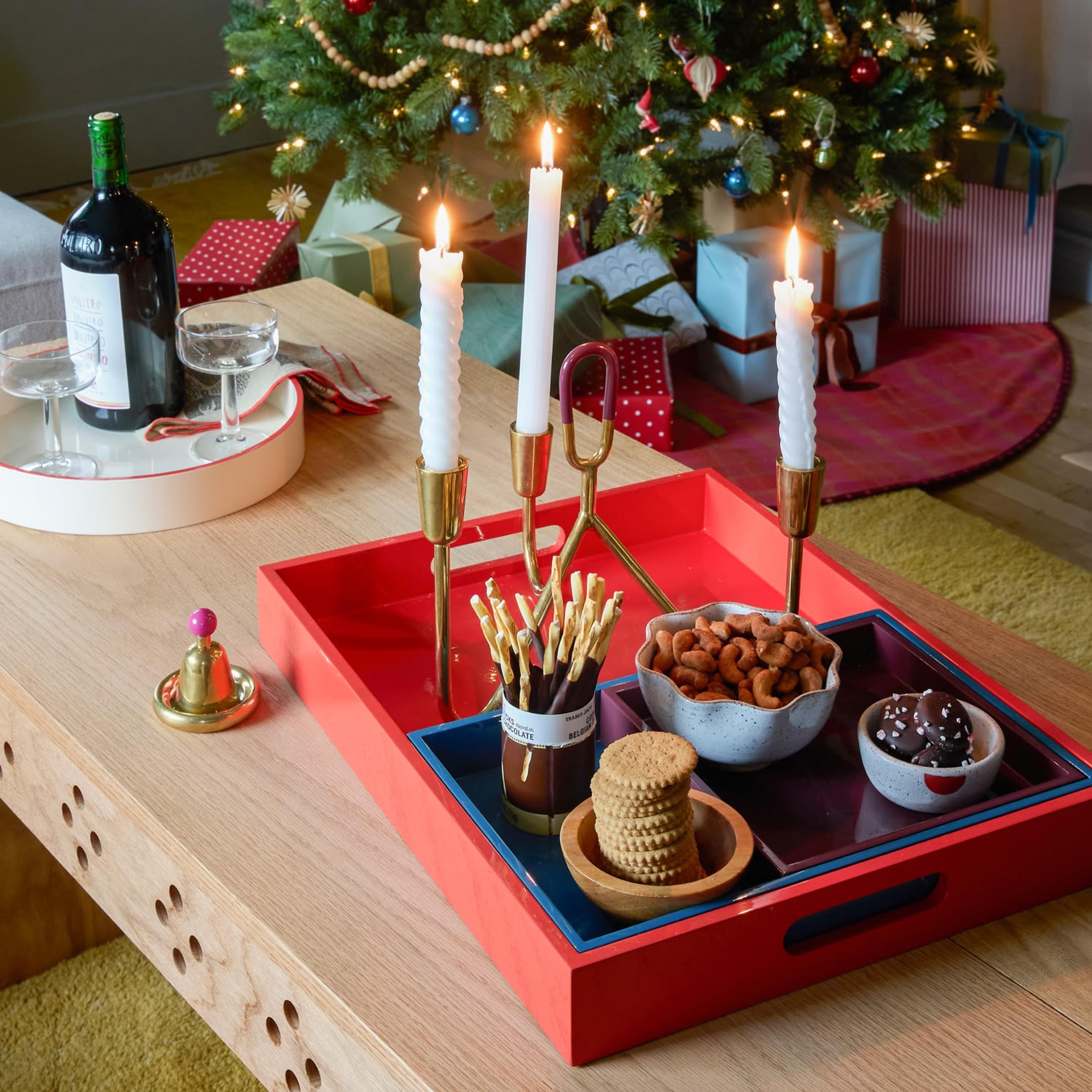 Coffee table with snacks and tapered candles