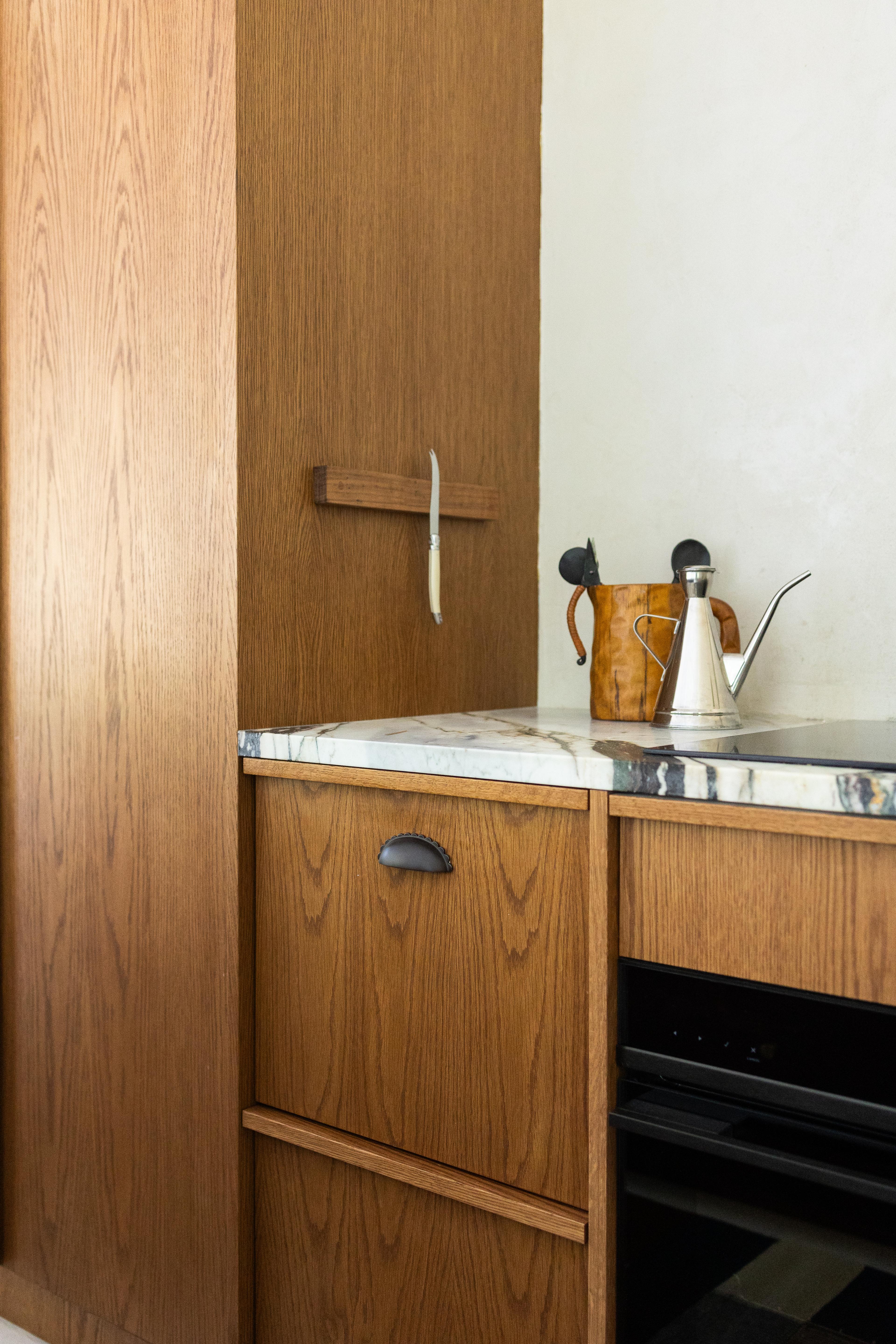 Kitchen pull on cabinet.