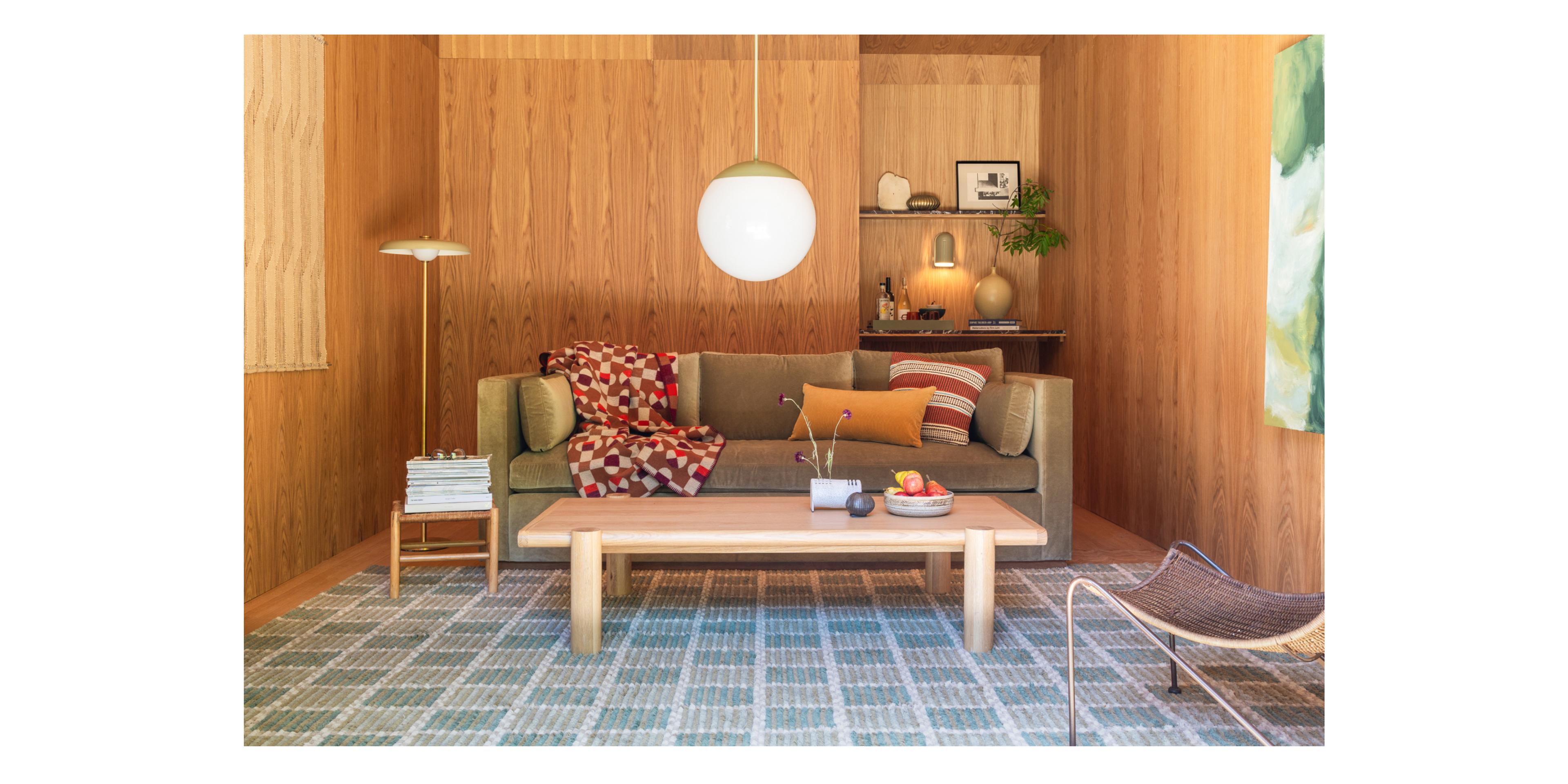 wood paneled room with couch