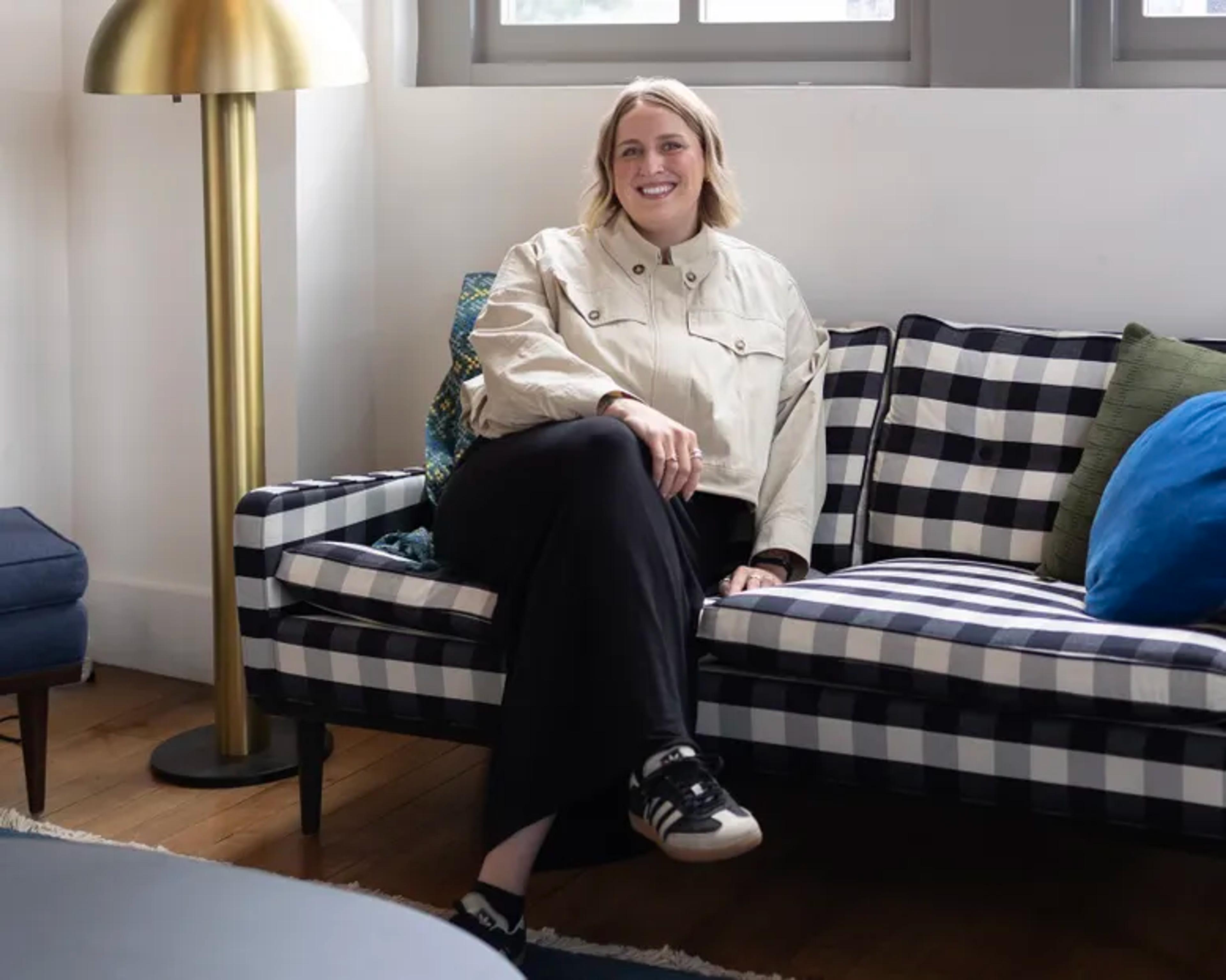 image of woman sitting on a couch