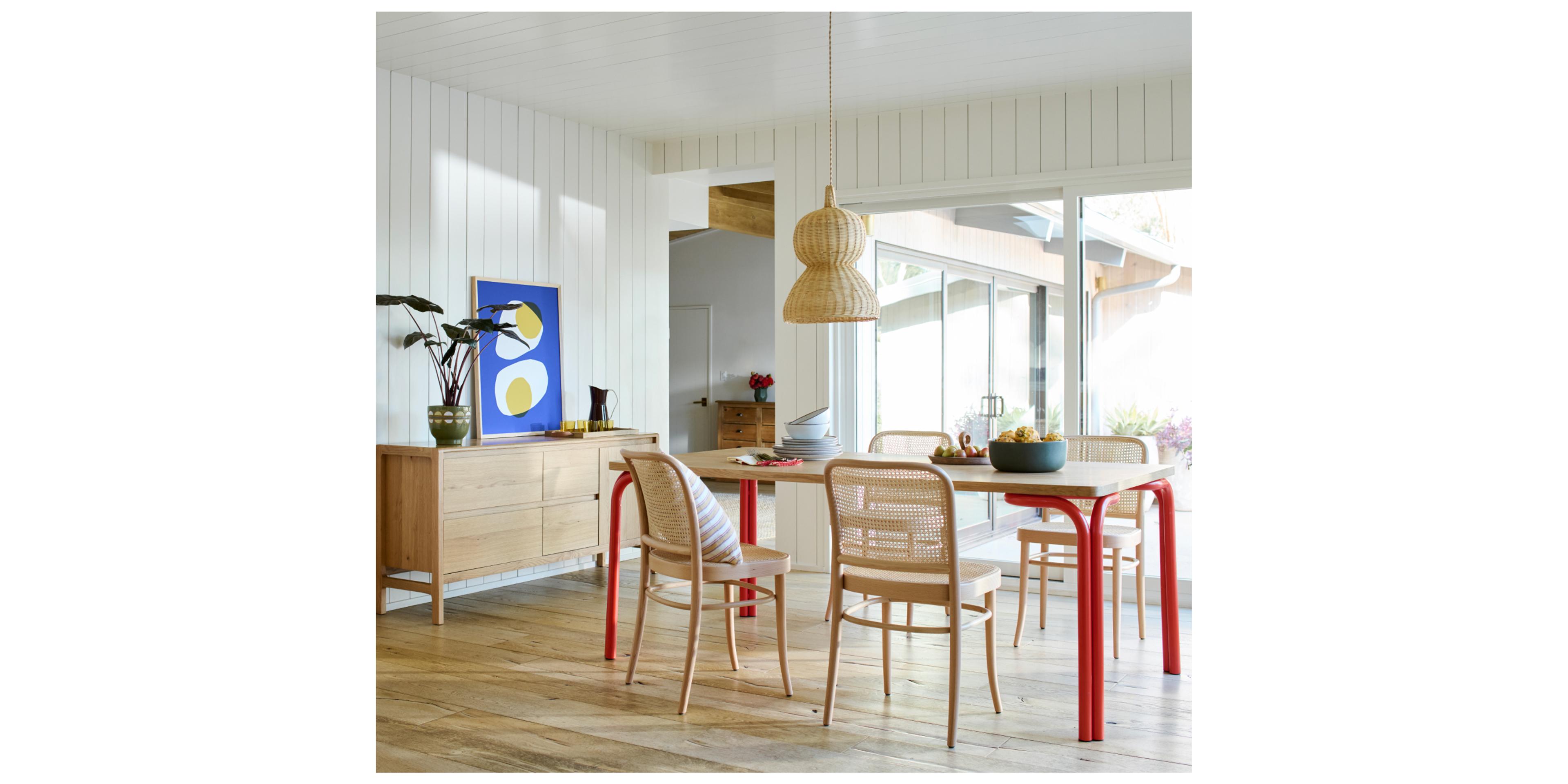 wood paneled dining room with persimmon accents 