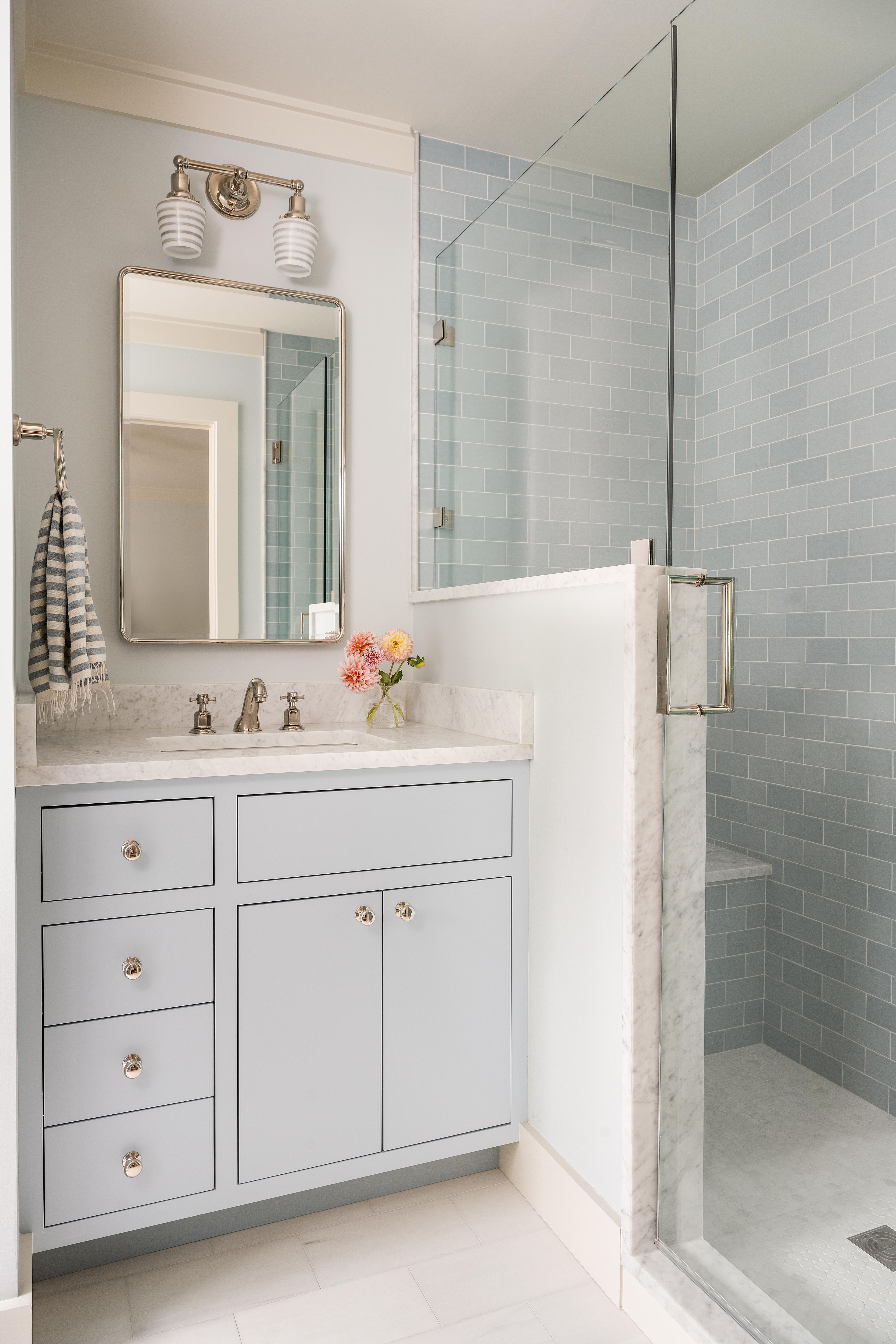 Marble bathroom with sink and shower